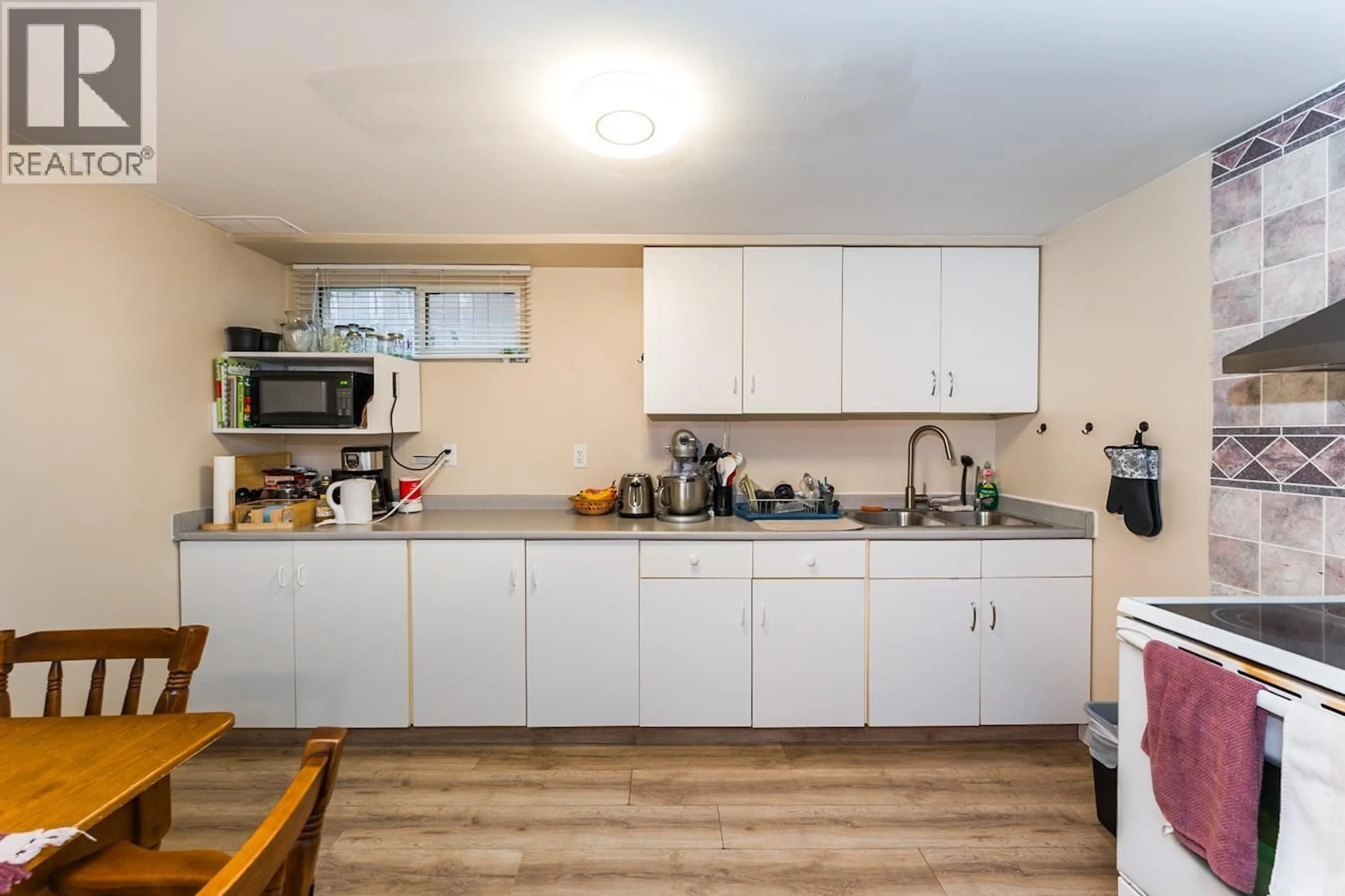 Standard kitchen, wood/laminate floor for 1190 EWERT STREET, Prince George British Columbia V2M2P2