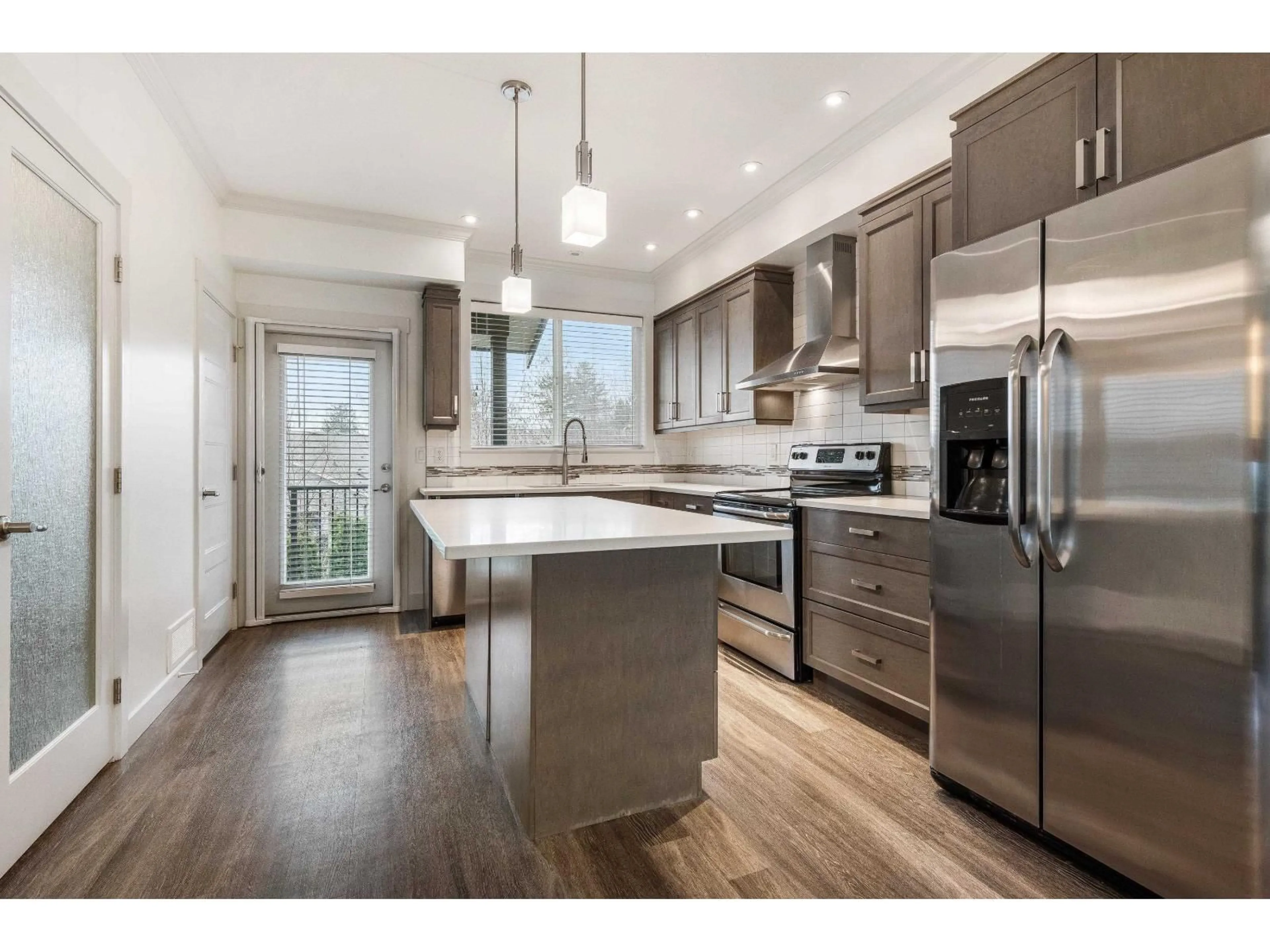 Open concept kitchen, wood/laminate floor for 19 - 5756 PROMONTORY ROAD, Chilliwack British Columbia V2R0V8