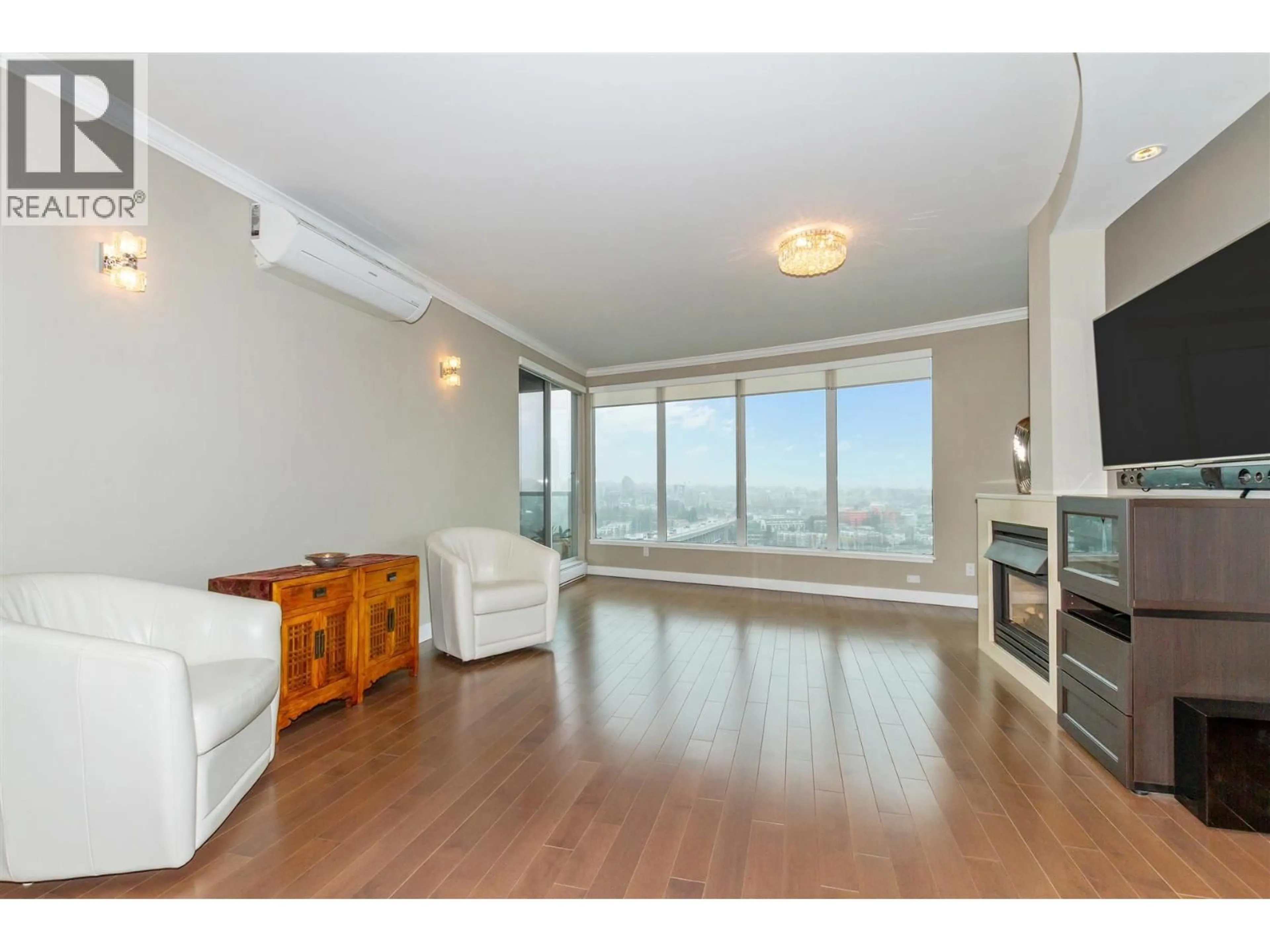 Living room with furniture, wood/laminate floor for 2302 - 1500 HOWE STREET, Vancouver British Columbia V6Z2N1