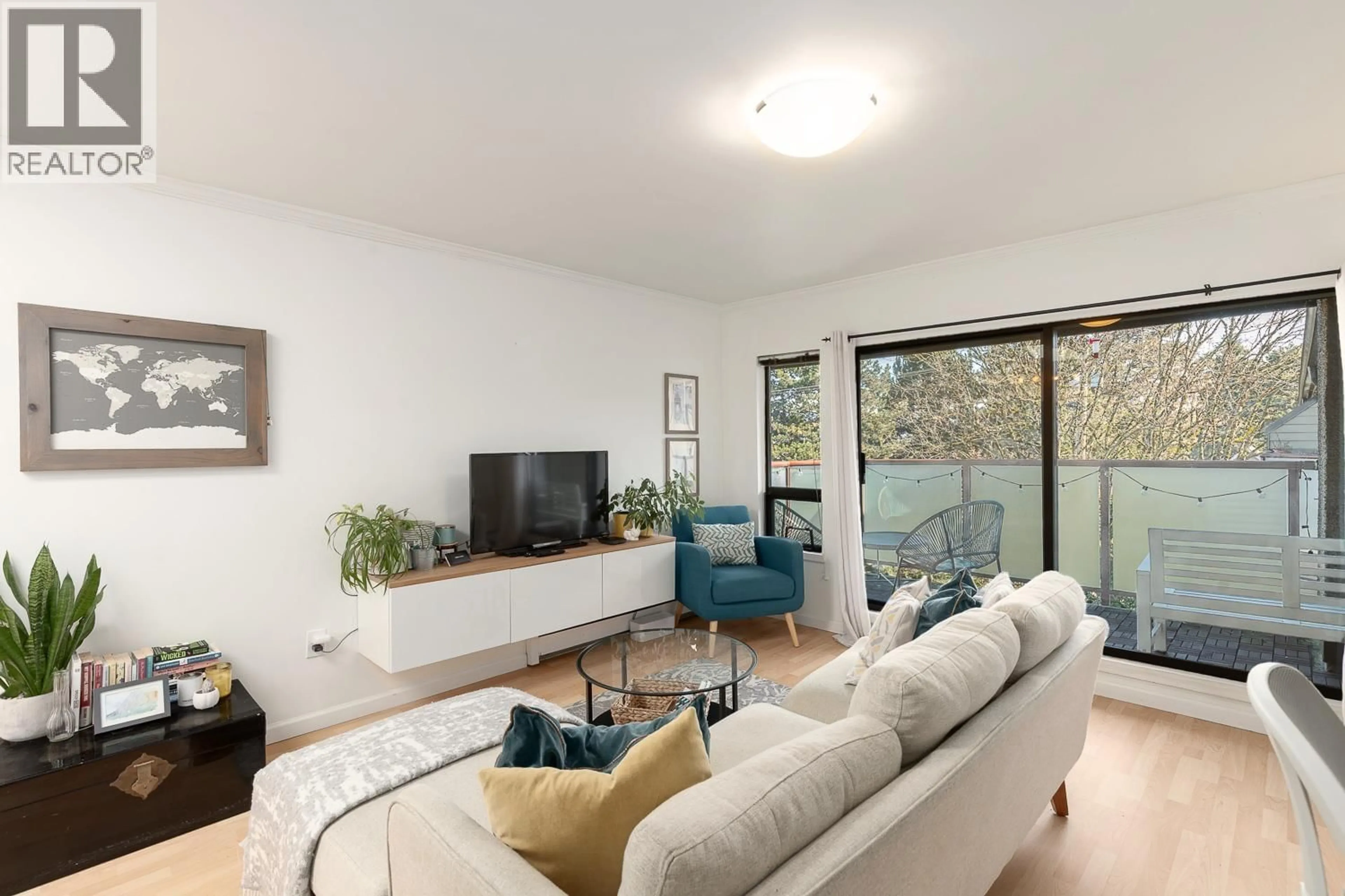 Living room with furniture, unknown for 309 - 2150 BRUNSWICK STREET, Vancouver British Columbia V5T3L5