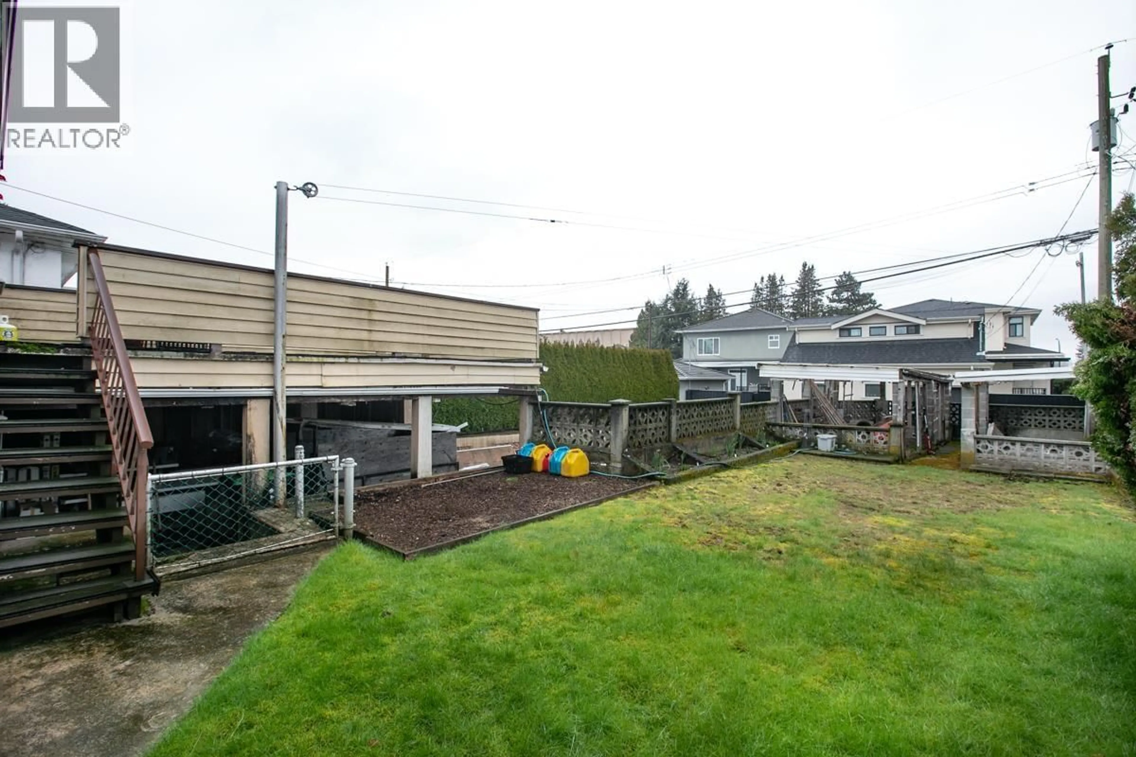 A pic from outside/outdoor area/front of a property/back of a property/a pic from drone, street for 2435 49TH AVENUE, Vancouver British Columbia V5S1J3