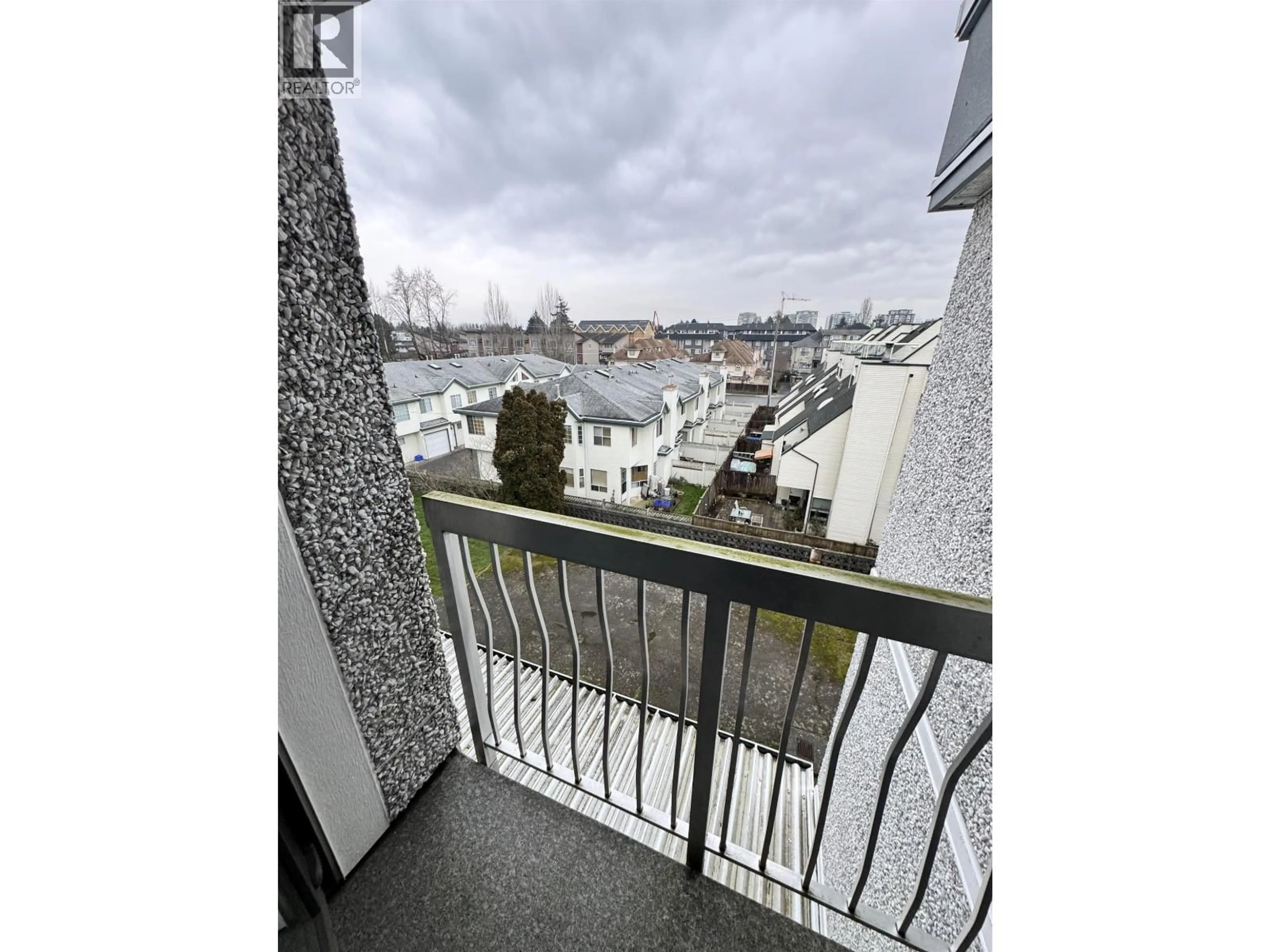 Balcony in the apartment, city buildings view from balcony for 312 - 6420 BUSWELL STREET, Richmond British Columbia V6Y2E9