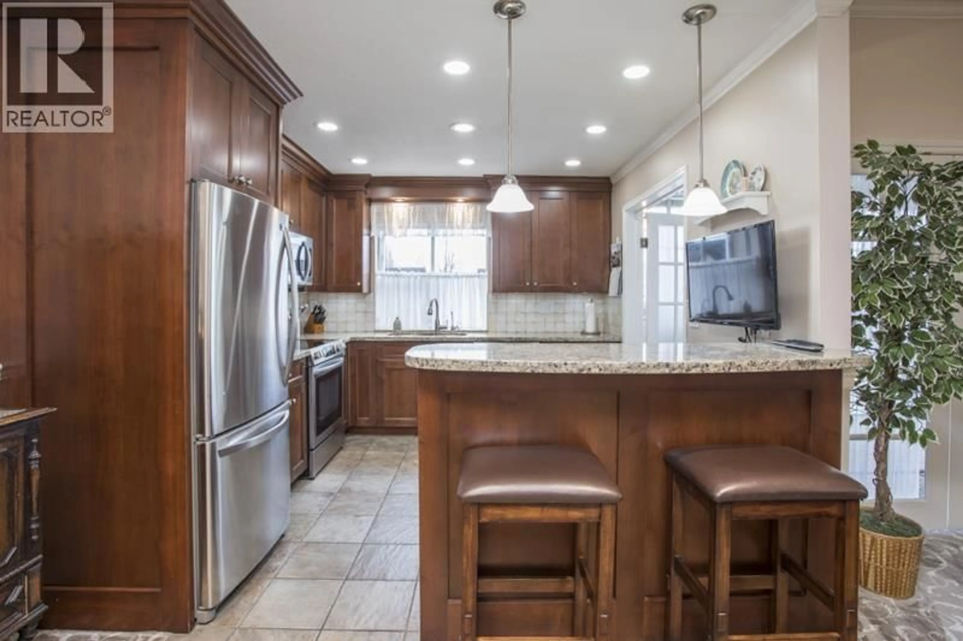 Open concept kitchen, ceramic/tile floor for 40 - 7540 ABERCROMBIE DRIVE, Richmond British Columbia V6Y3J8