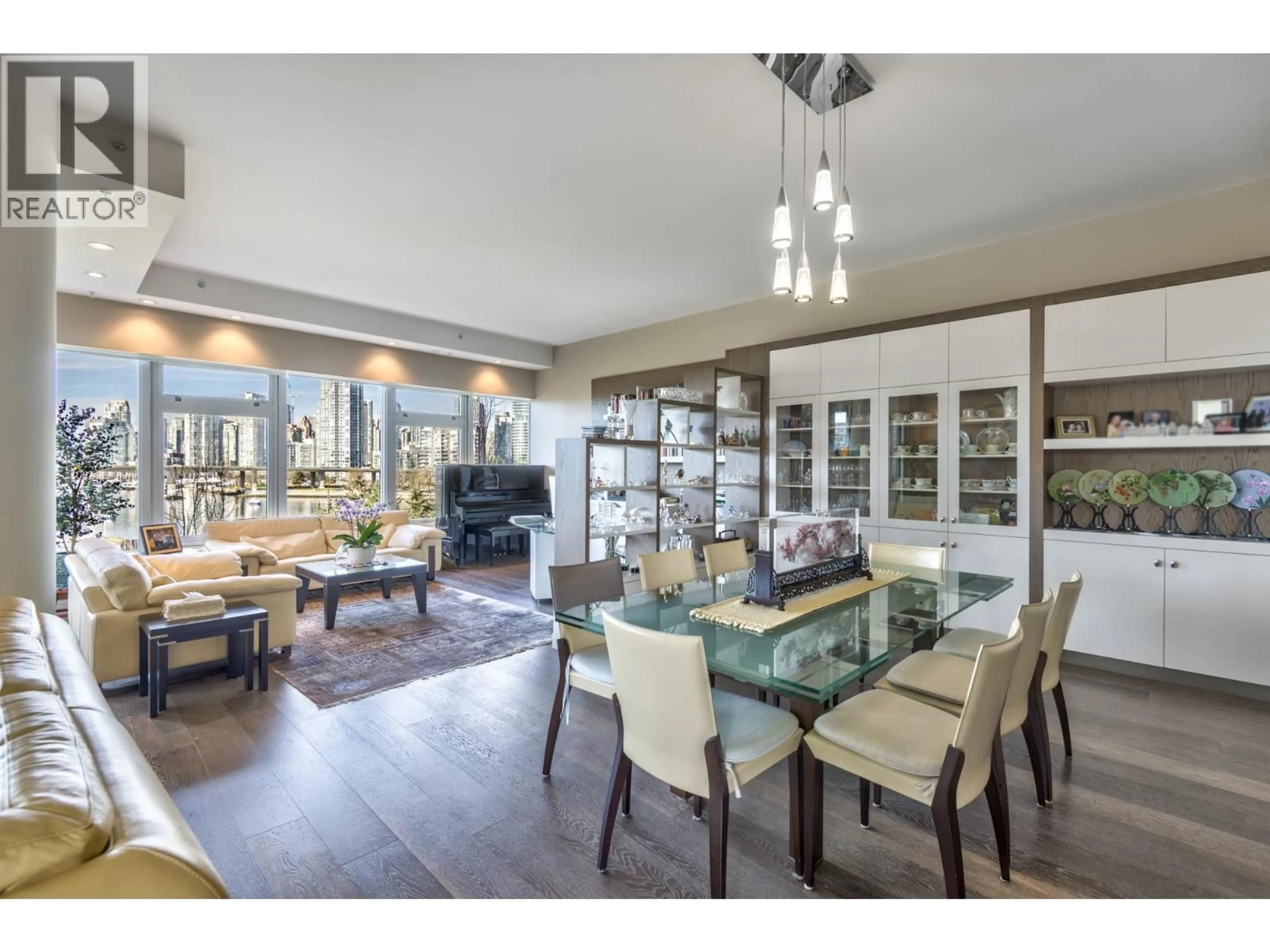 Dining room, wood/laminate floor for 504 - 181 ATHLETES WAY, Vancouver British Columbia V5Y0E5