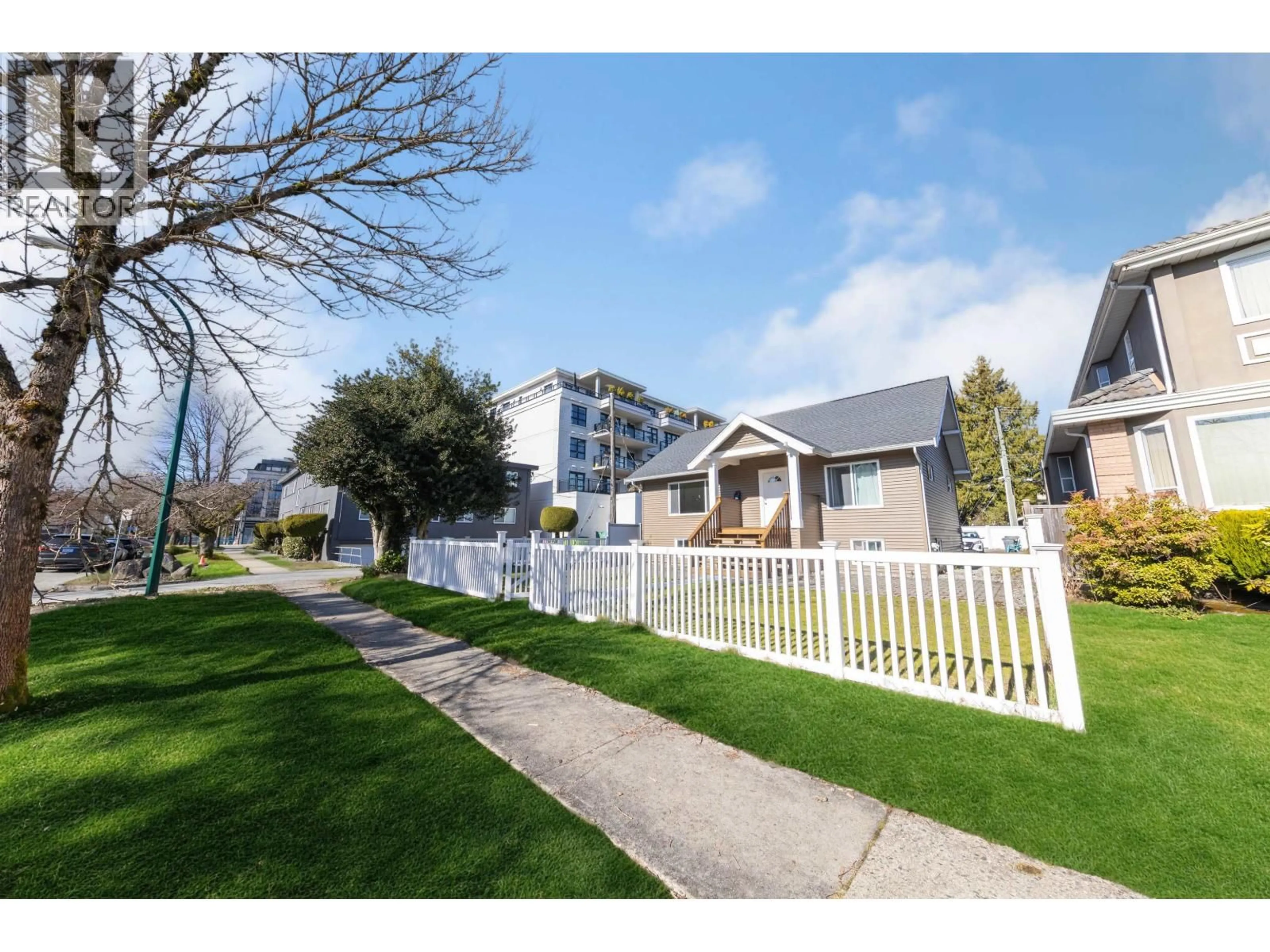 A pic from outside/outdoor area/front of a property/back of a property/a pic from drone, street for 2079 46TH AVENUE, Vancouver British Columbia V6M2K8