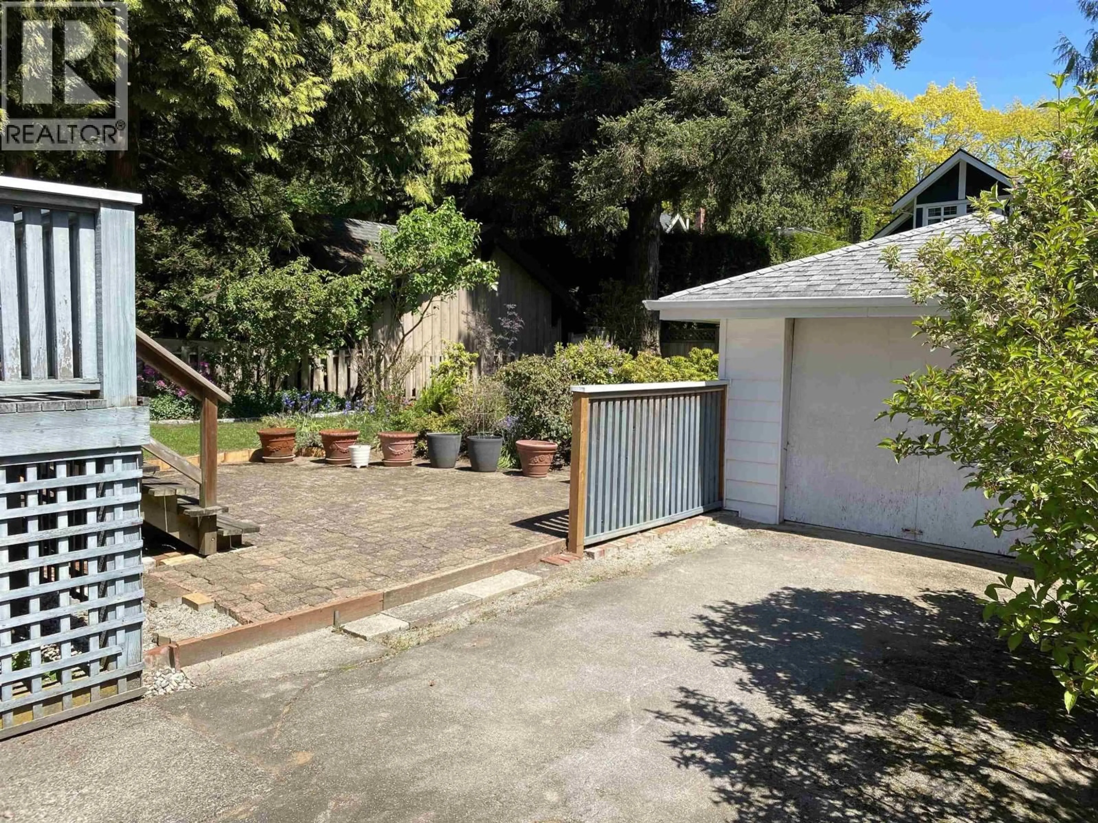 A pic from outside/outdoor area/front of a property/back of a property/a pic from drone, street for 5876 HIGHBURY STREET, Vancouver British Columbia V6N1Z1