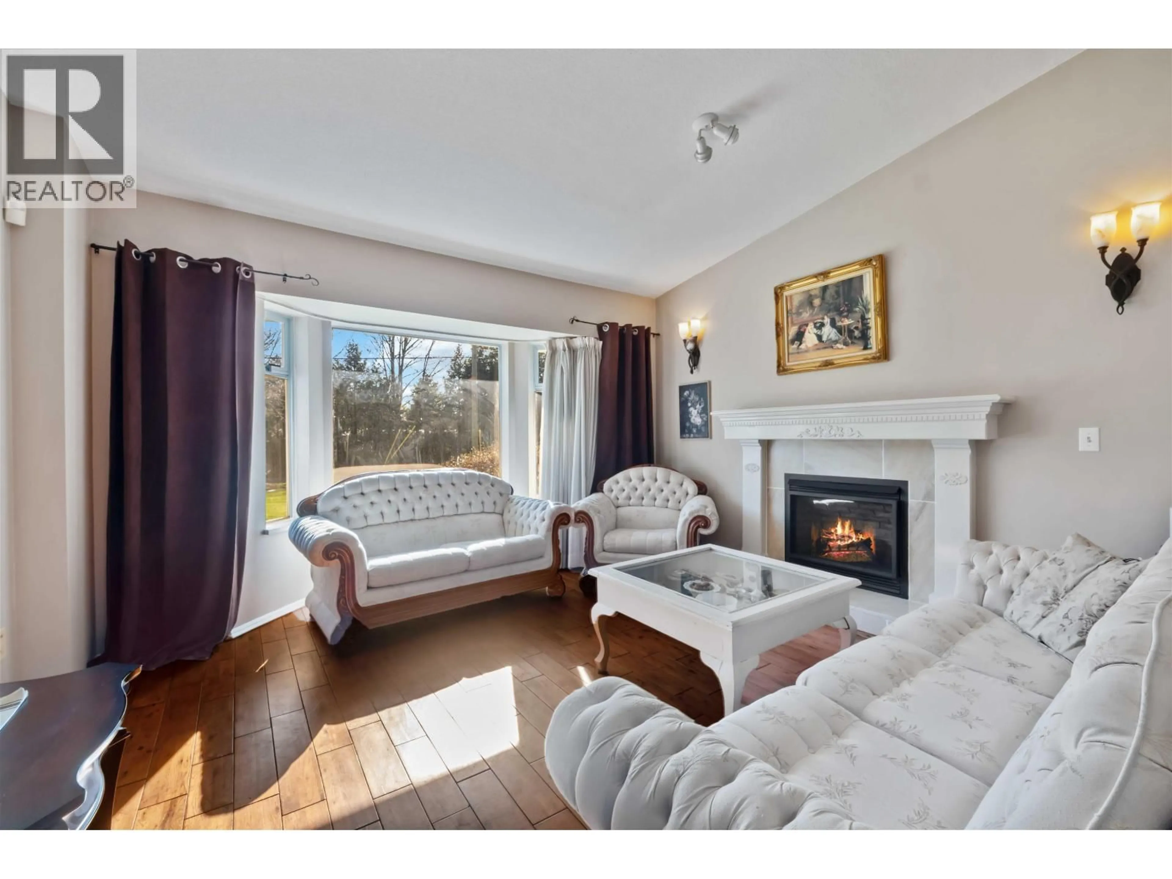 Living room with furniture, wood/laminate floor for 24109 124 AVENUE, Maple Ridge British Columbia V4R1N3