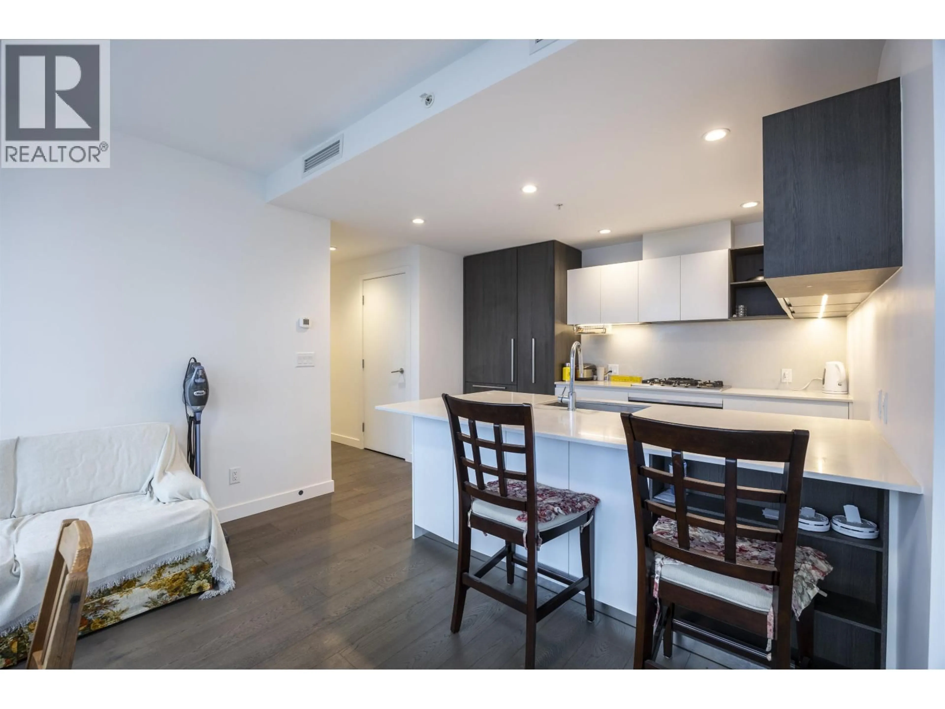 Open concept kitchen, wood/laminate floor for 507 - 6000 MCKAY AVENUE, Burnaby British Columbia V5H0K2