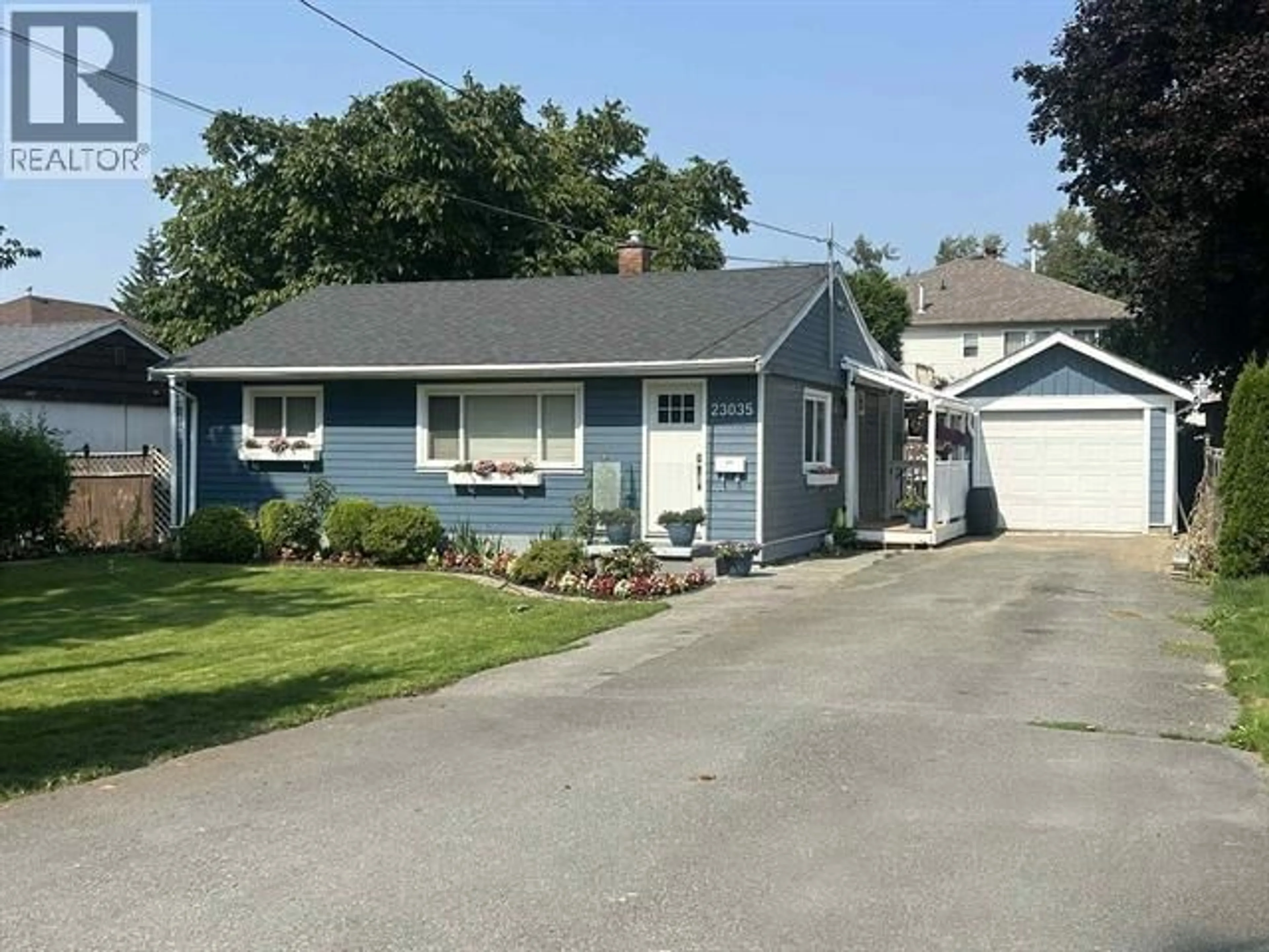 Home with vinyl exterior material, street for 23035 117 AVENUE, Maple Ridge British Columbia V2X2K3