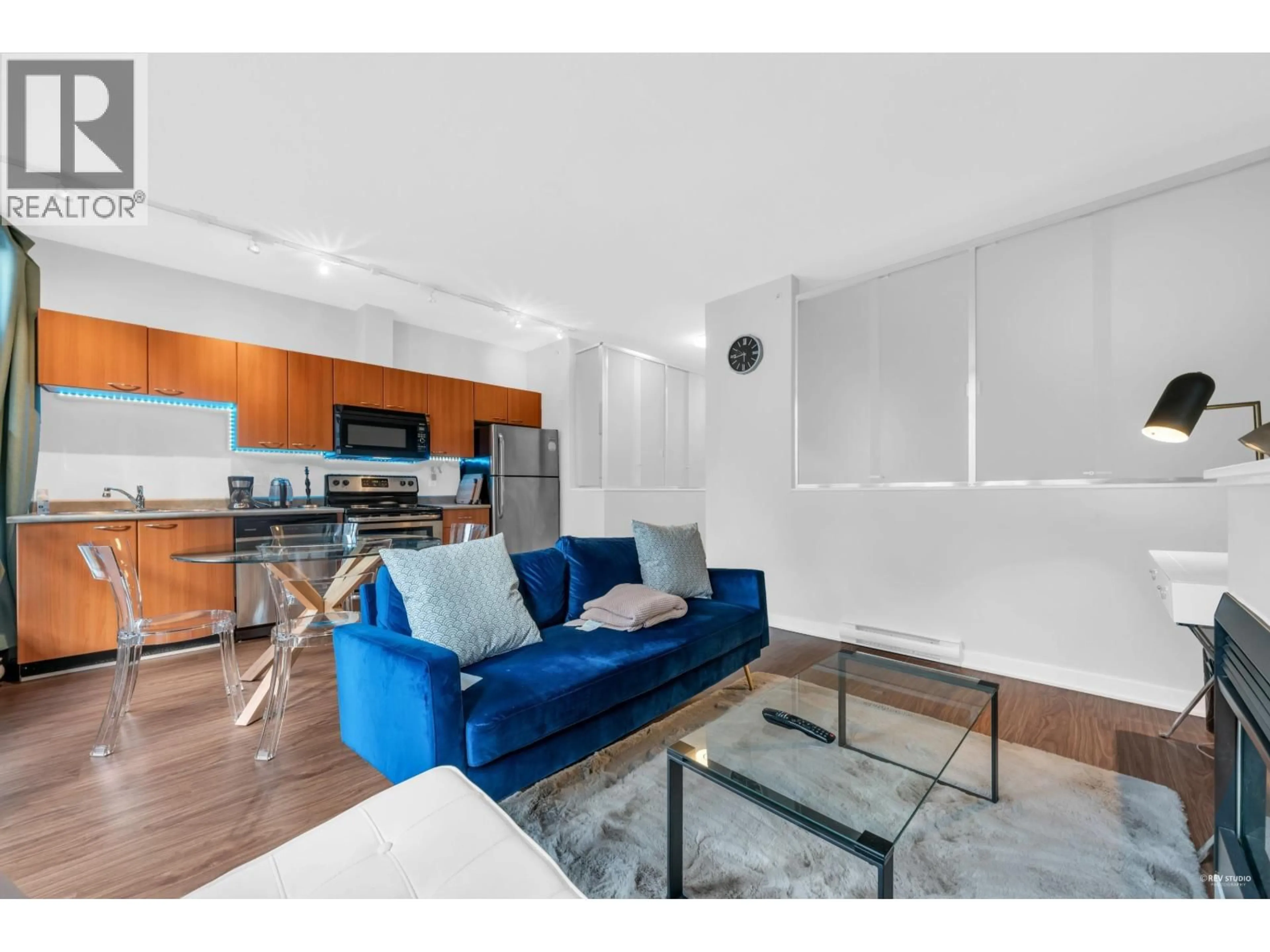 Living room with furniture, wood/laminate floor for 406 - 1249 GRANVILLE STREET, Vancouver British Columbia V6Z1M5