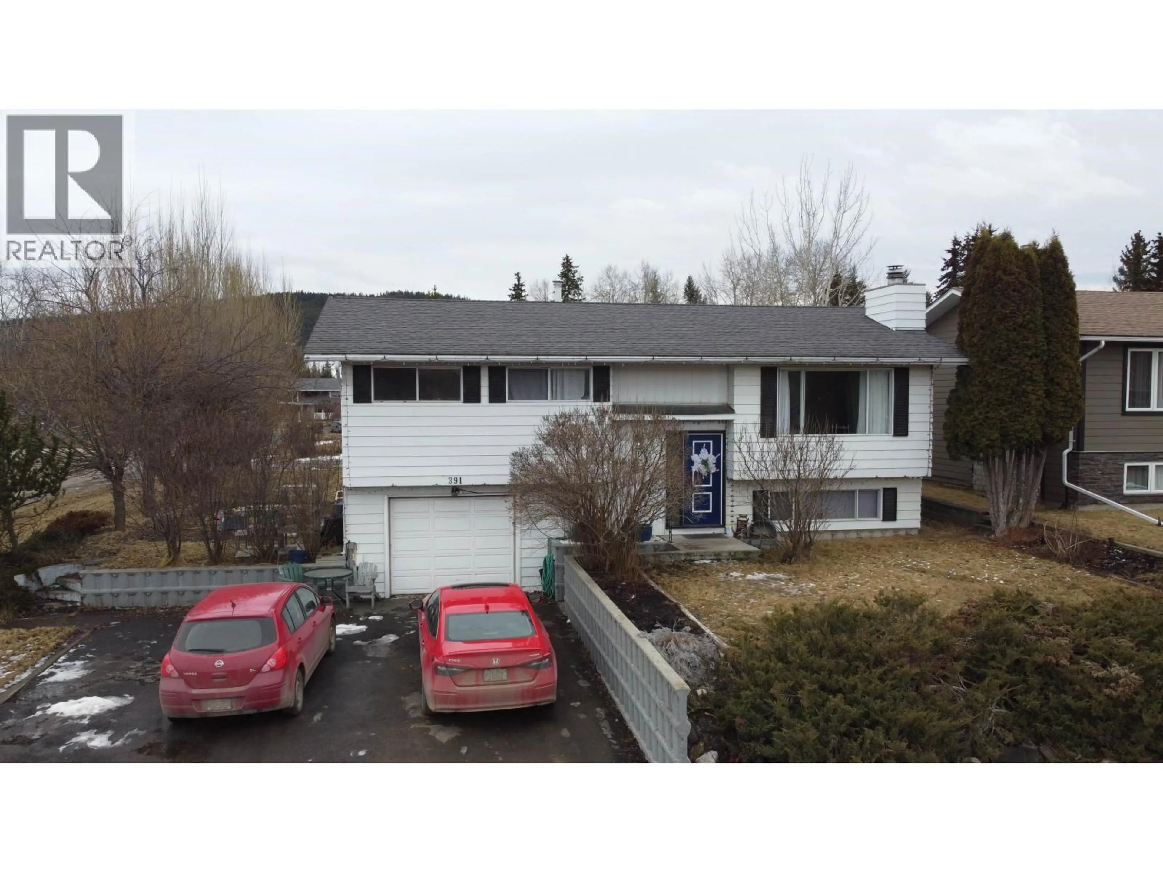 A pic from outside/outdoor area/front of a property/back of a property/a pic from drone, street for 391 BIRCH AVENUE, 100 Mile House British Columbia V0K2E0