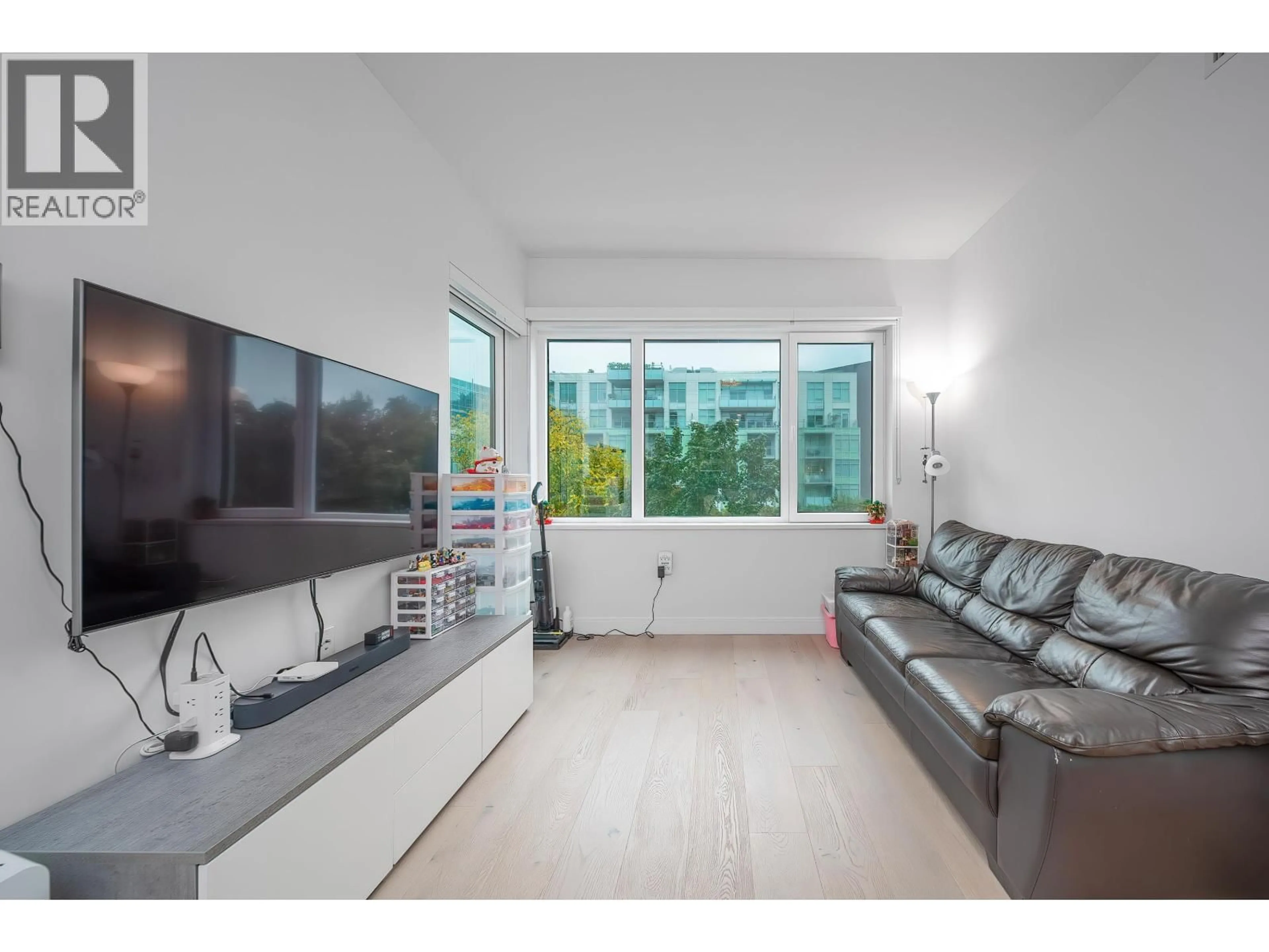 Living room with furniture, unknown for 205 - 4932 CAMBIE STREET, Vancouver British Columbia V5Z0K1