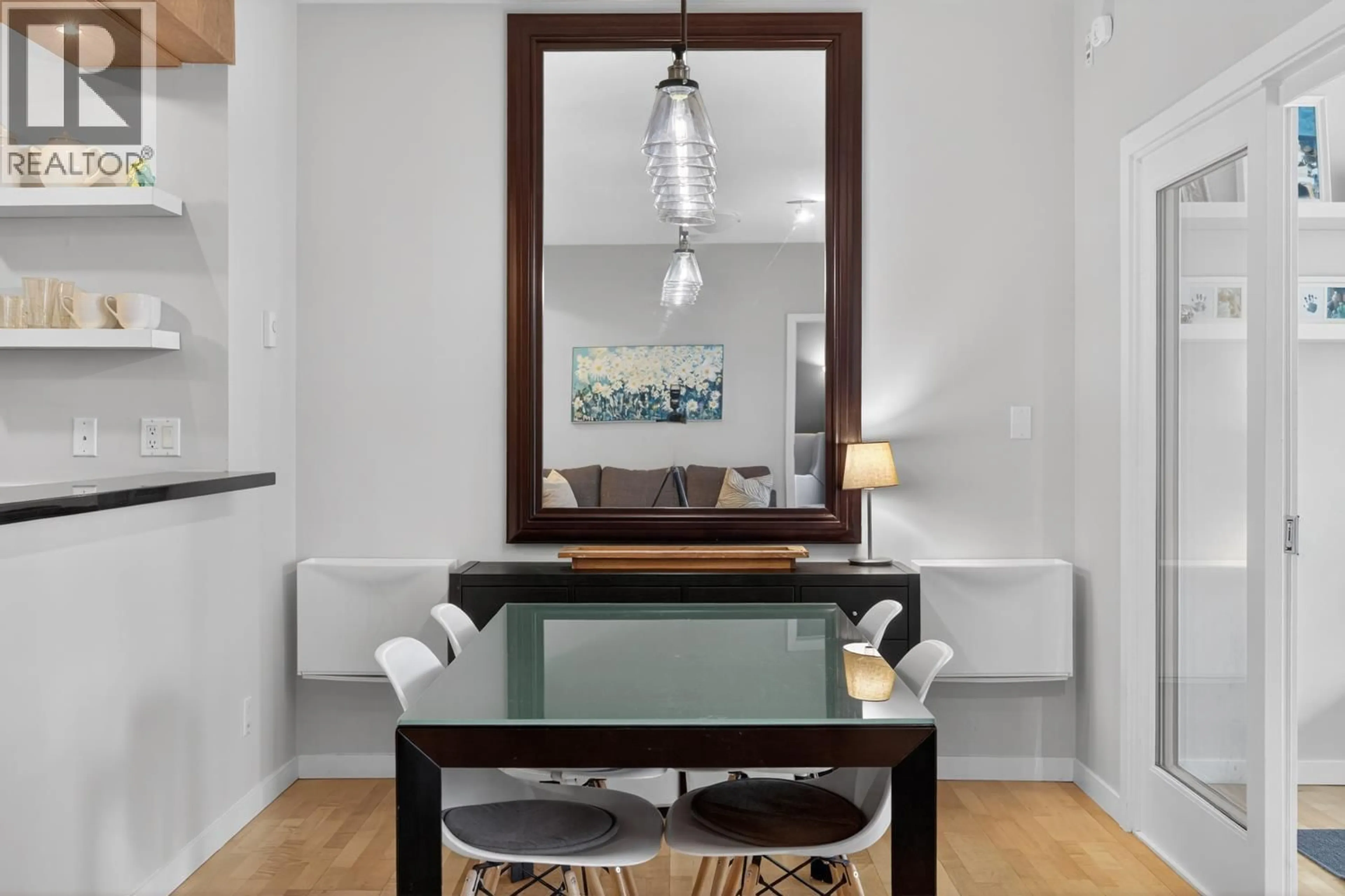 Dining room, wood/laminate floor for 222 - 560 RAVEN WOODS DRIVE, North Vancouver British Columbia V7G2T3