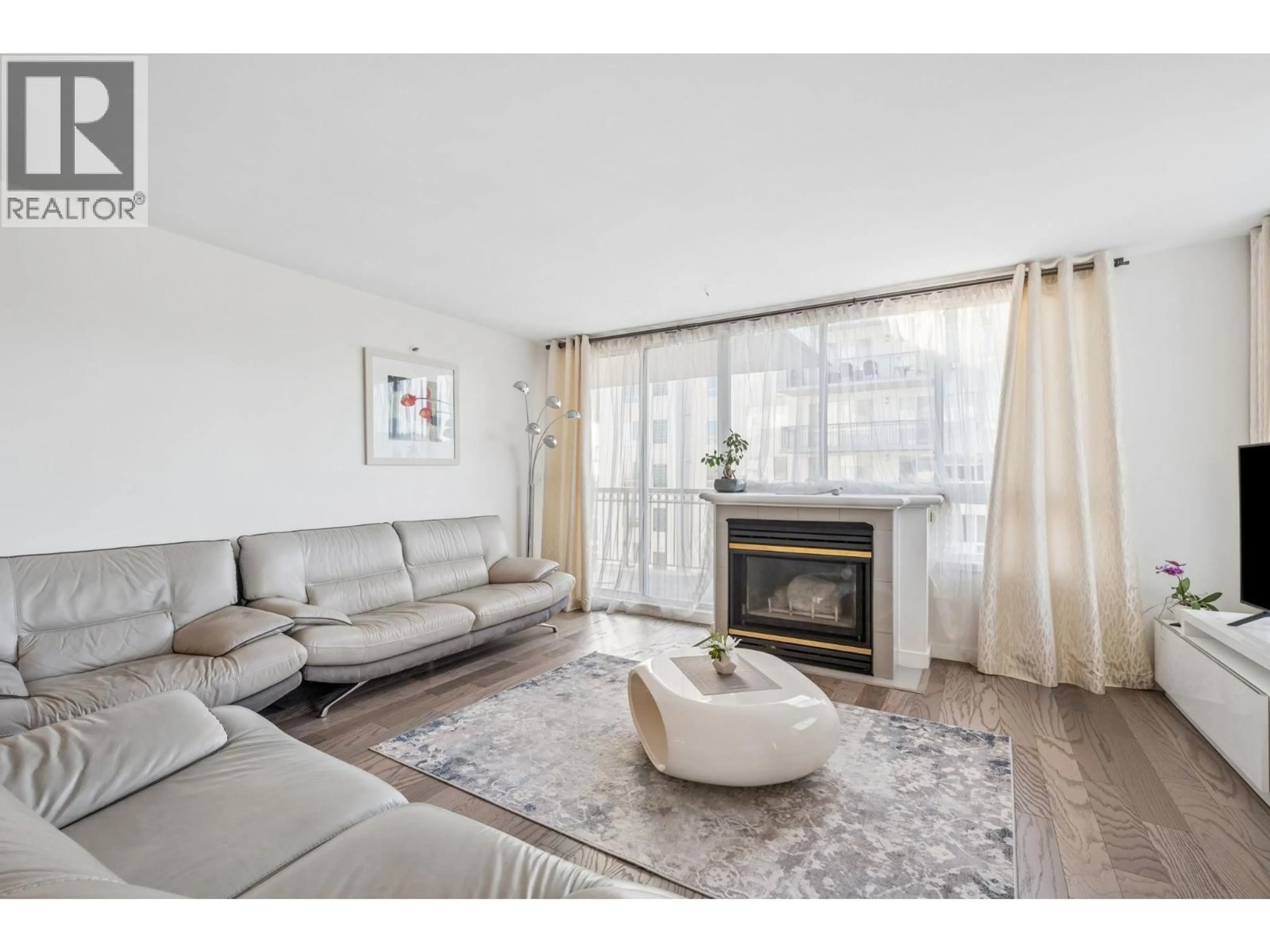 Living room with furniture, wood/laminate floor for 1902 - 555 AUSTIN AVENUE, Coquitlam British Columbia V3K6R8