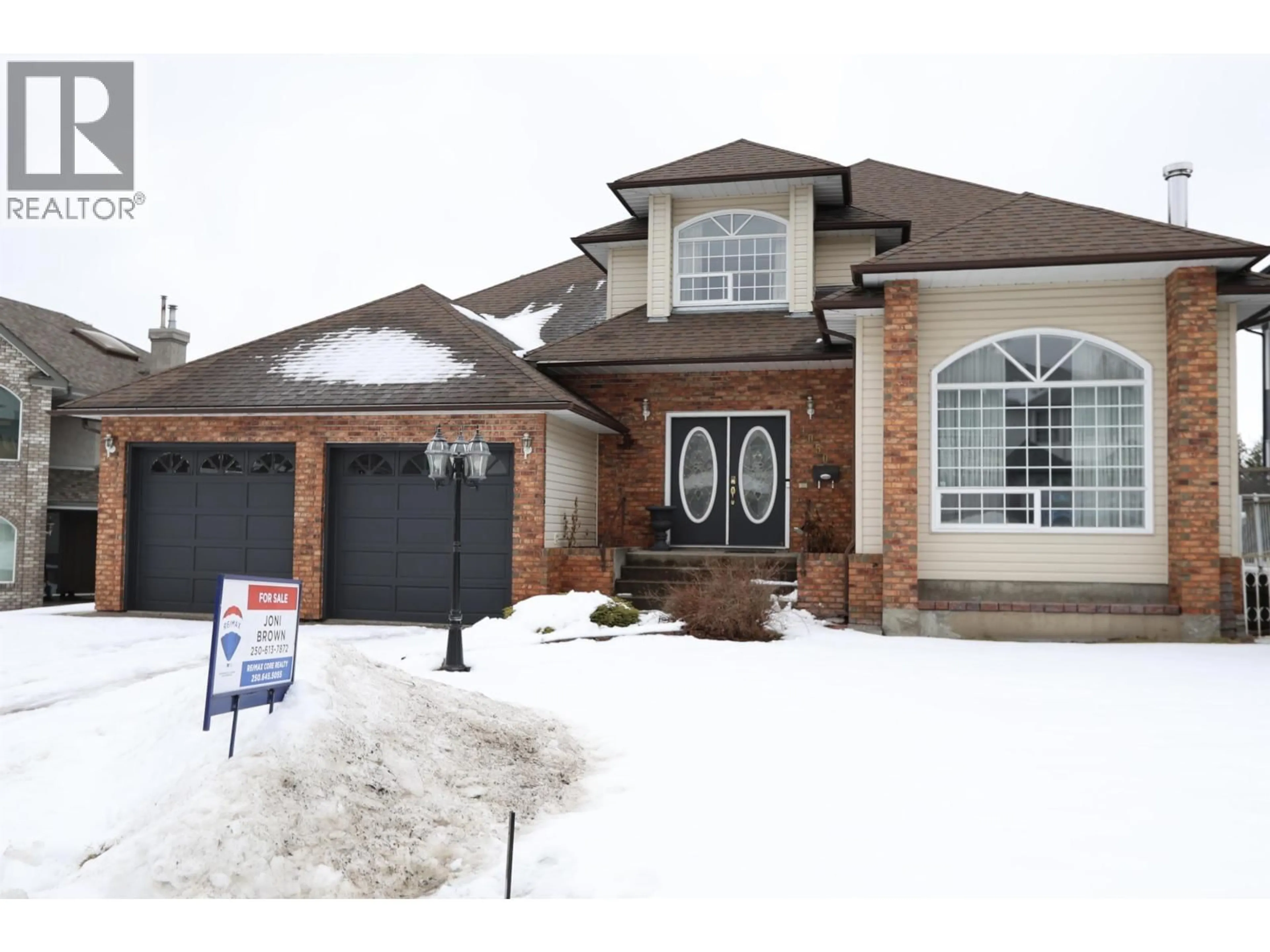 Home with brick exterior material, street for 4050 BARNES DRIVE, Prince George British Columbia V2N5K8