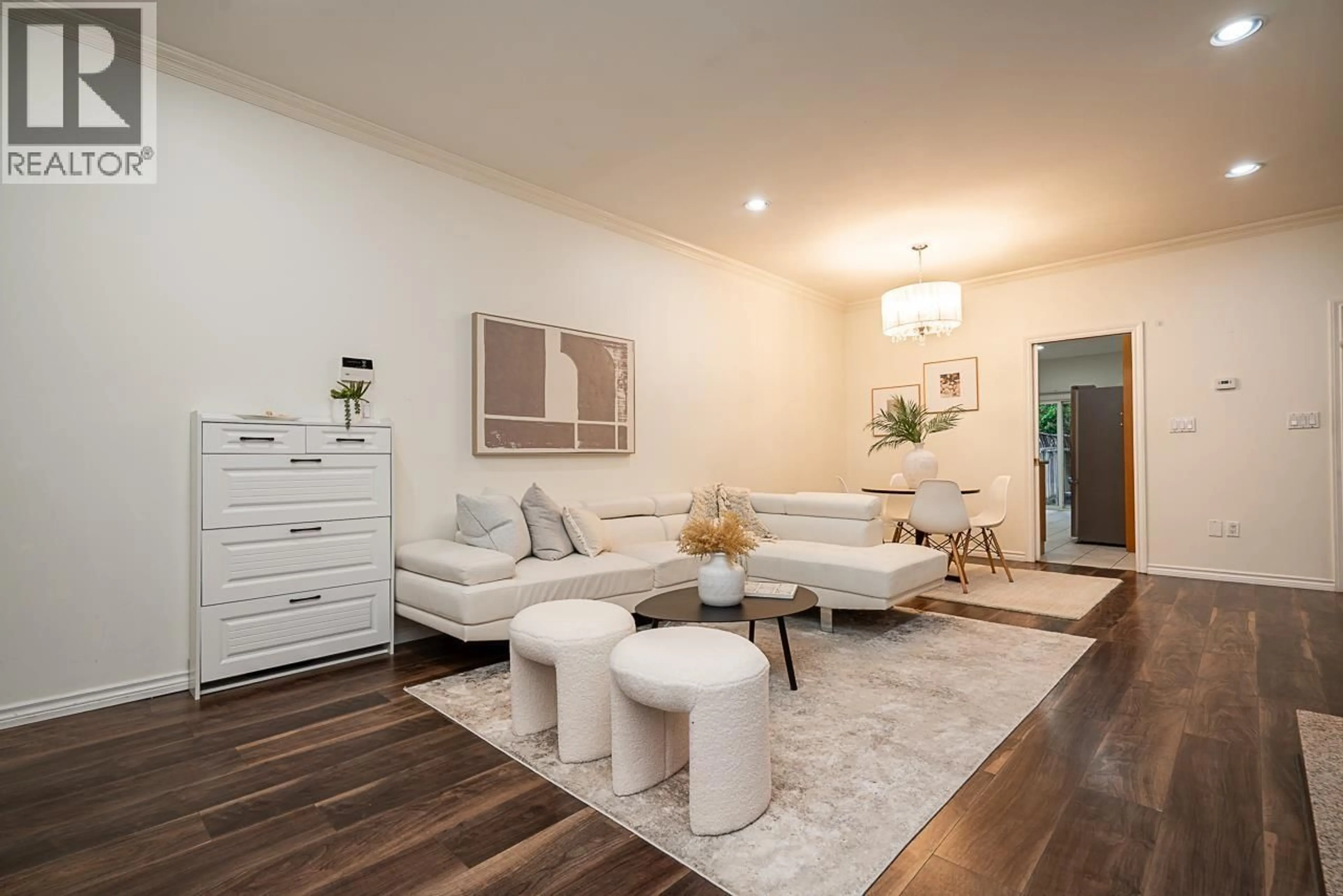 Living room with furniture, wood/laminate floor for 7408 18TH AVENUE, Burnaby British Columbia V3N1H5