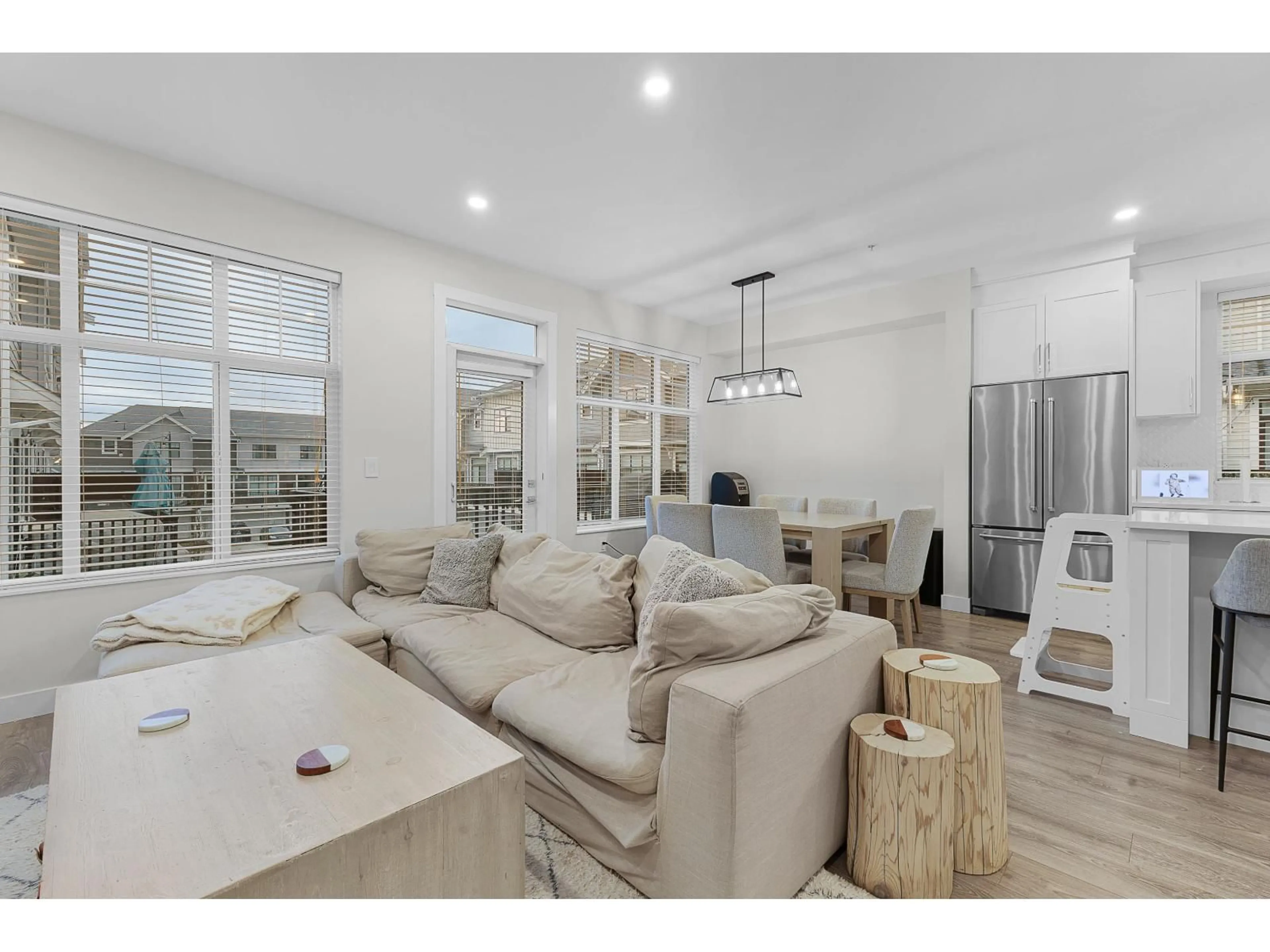 Living room with furniture, wood/laminate floor for 24 - 20327 72B AVENUE, Langley British Columbia V2Y4J6