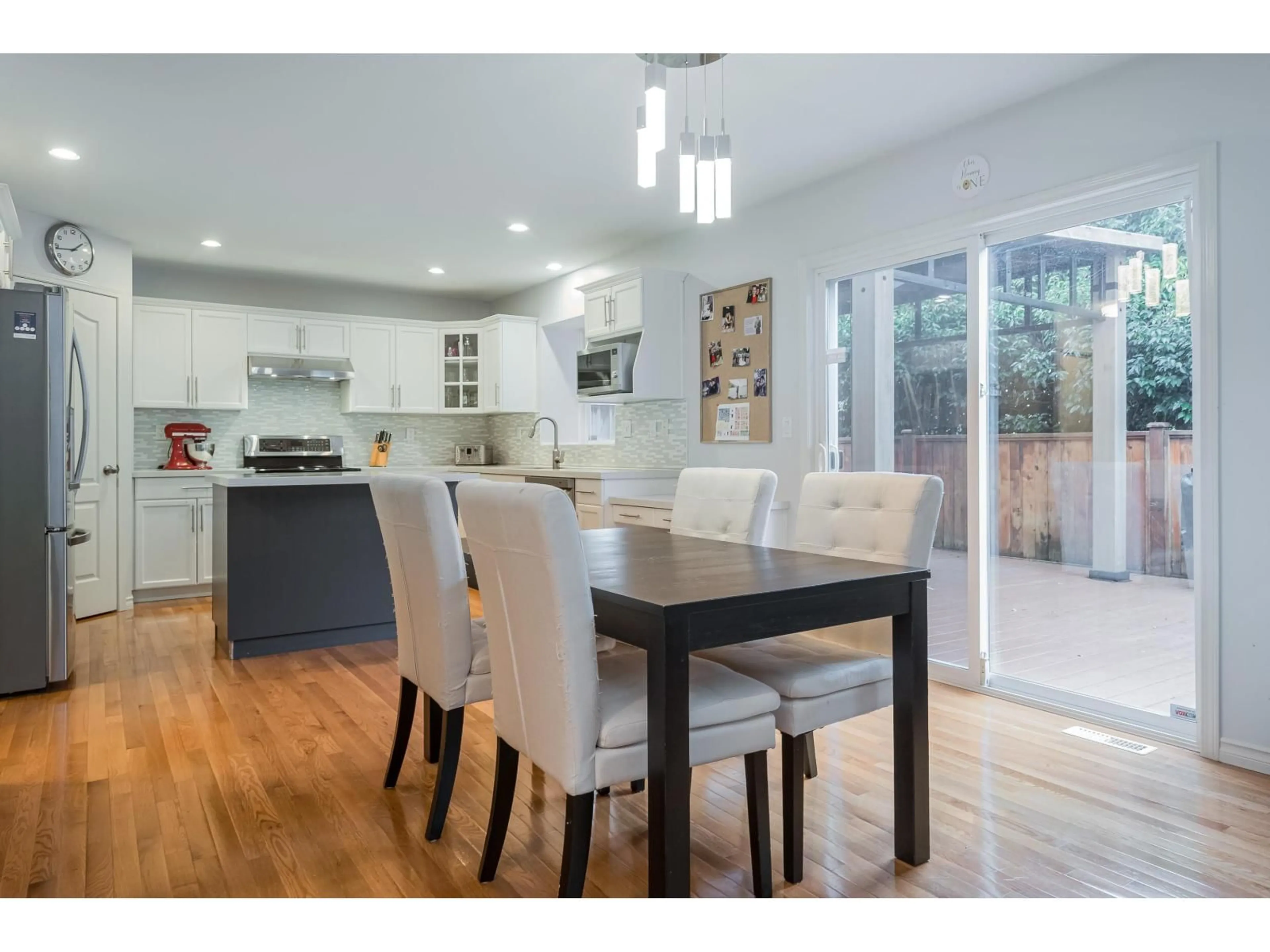 Open concept kitchen, wood/laminate floor for 20265 94B AVENUE, Langley British Columbia V1M3Z4