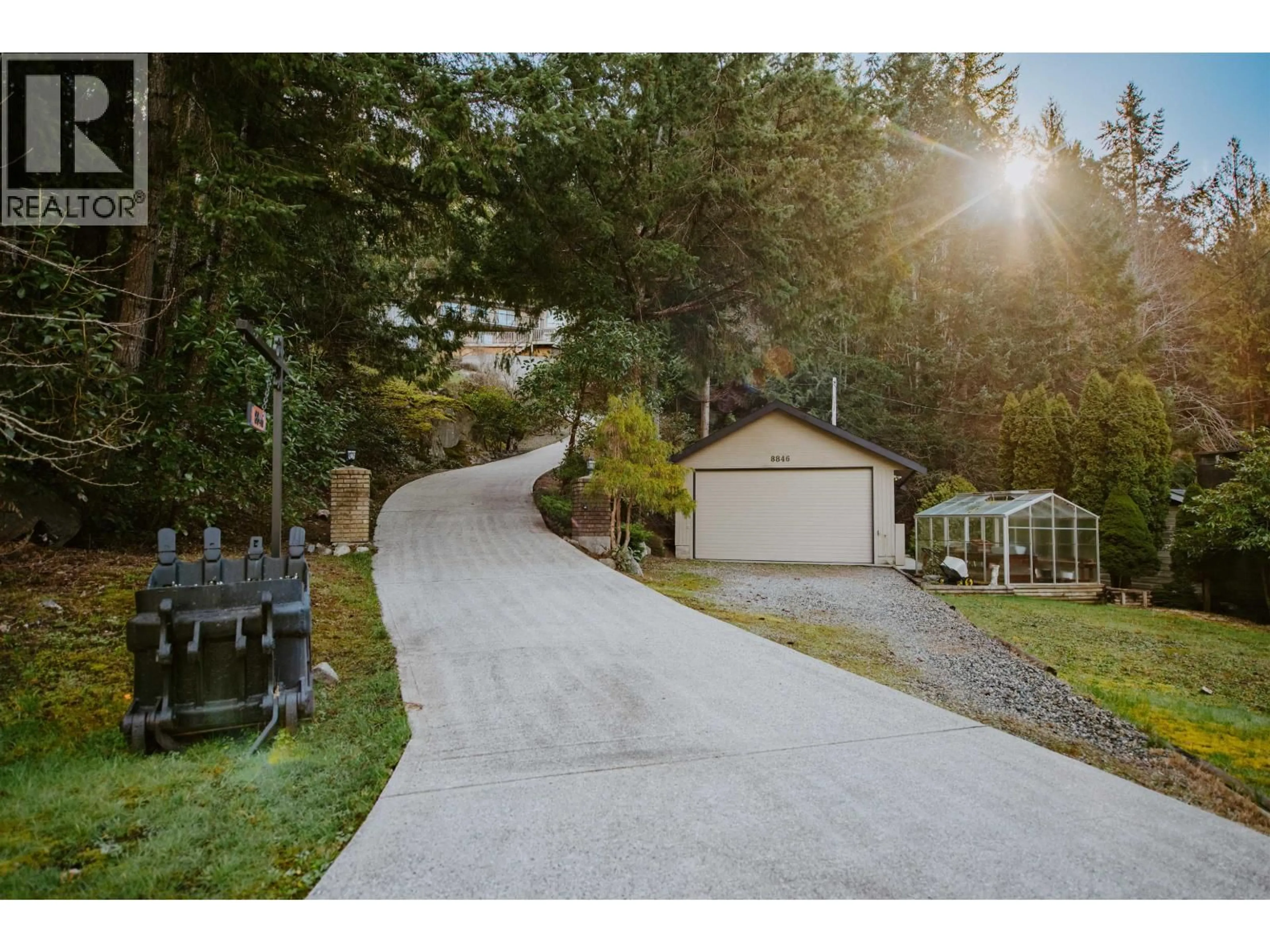 A pic from outside/outdoor area/front of a property/back of a property/a pic from drone, street for 8846 REDROOFFS ROAD, Halfmoon Bay British Columbia V7Z1B2