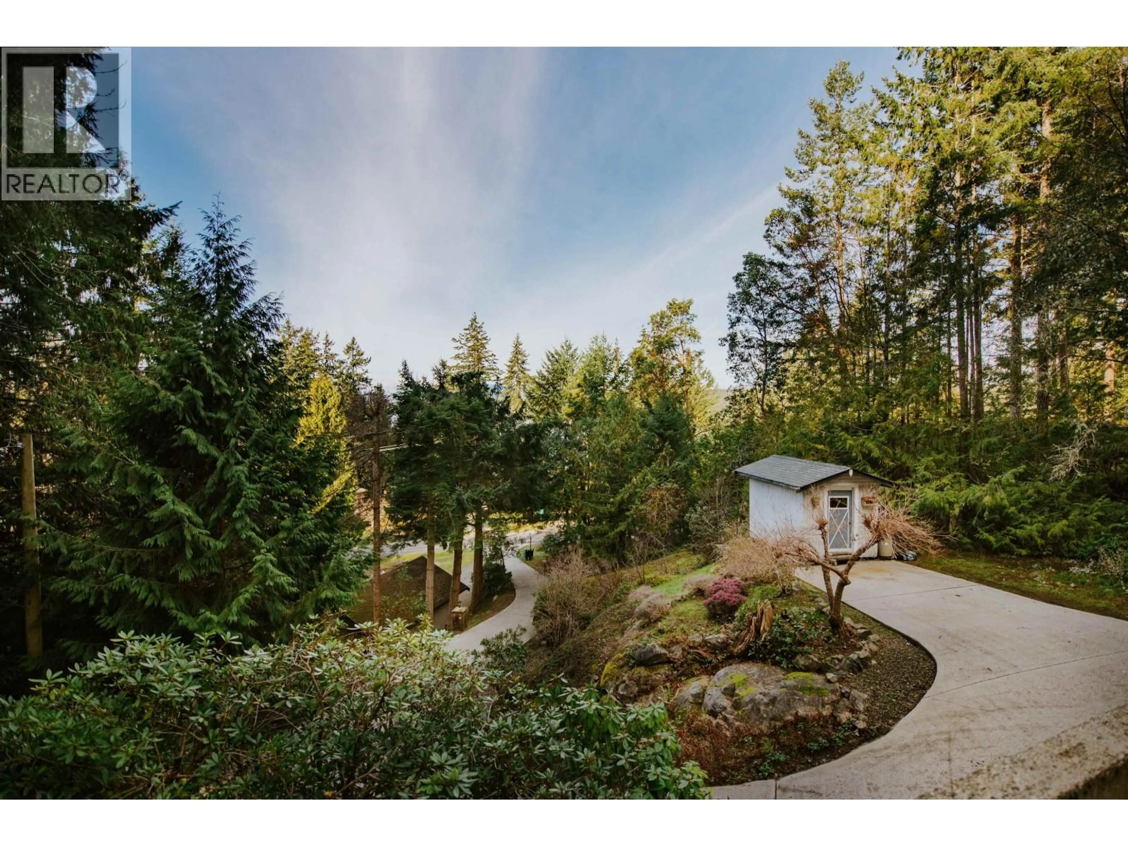 A pic from outside/outdoor area/front of a property/back of a property/a pic from drone, forest/trees view for 8846 REDROOFFS ROAD, Halfmoon Bay British Columbia V7Z1B2