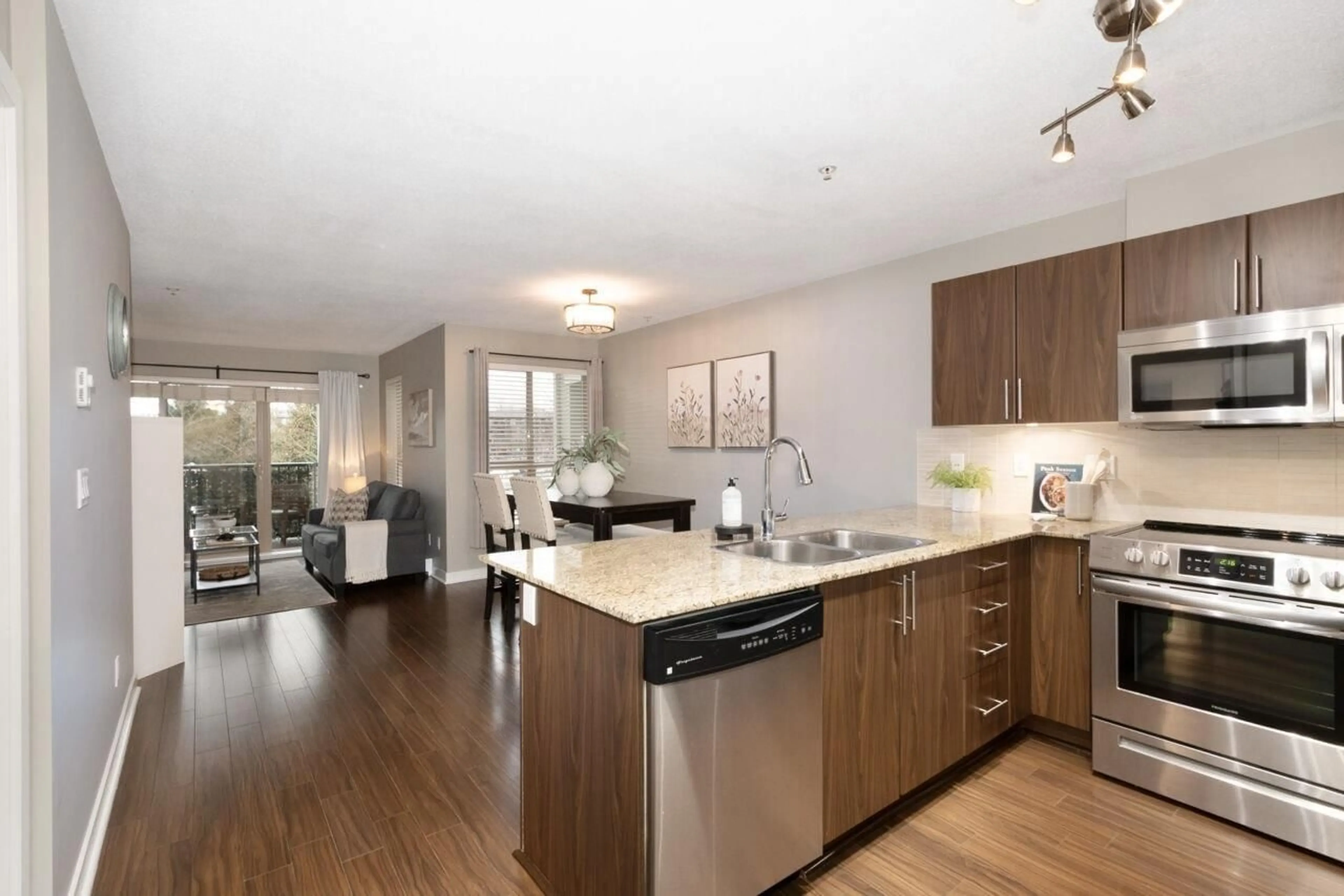 Open concept kitchen, wood/laminate floor for D207 - 8929 202 STREET, Langley British Columbia V1M0B4