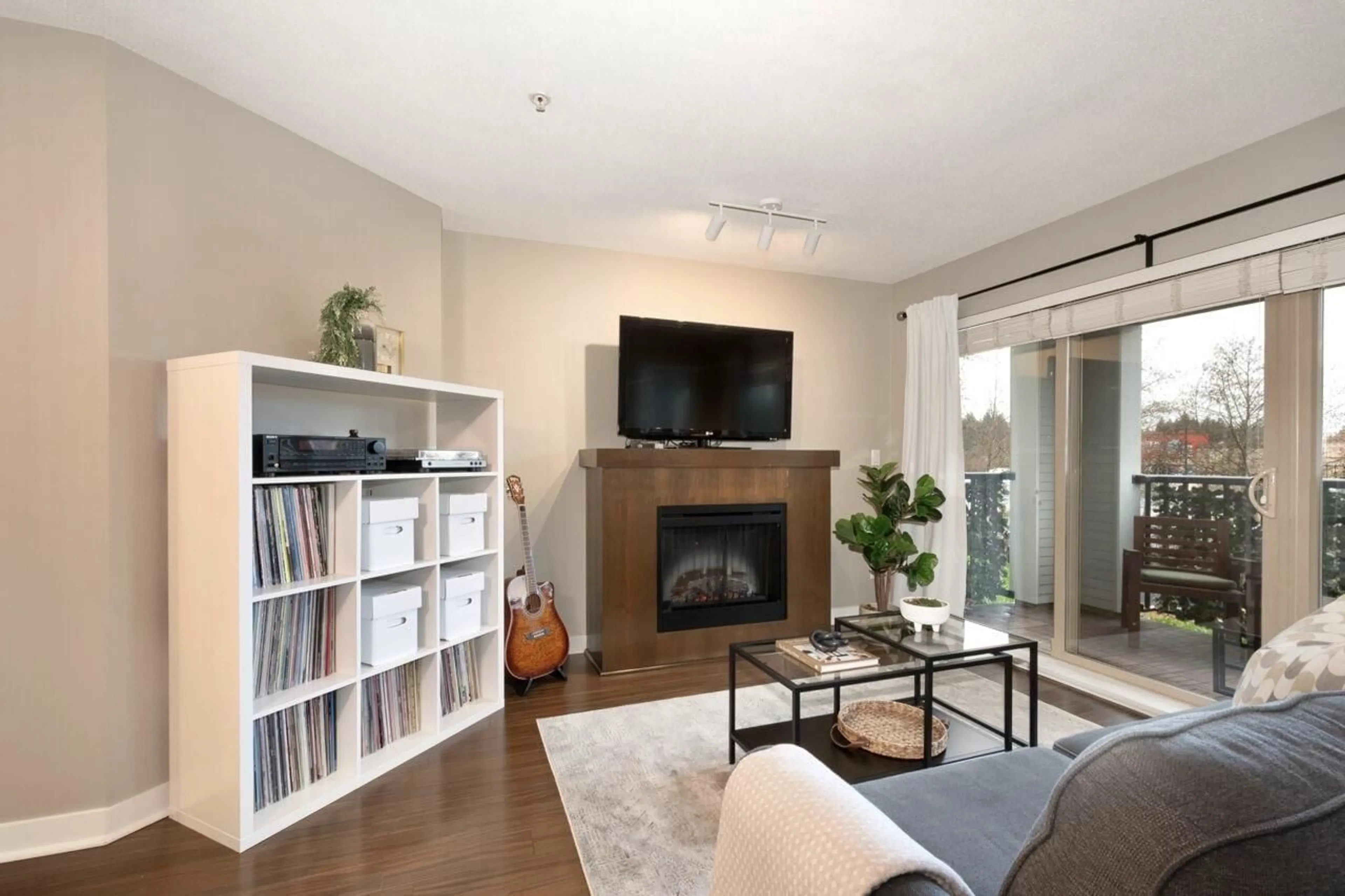 Living room with furniture, wood/laminate floor for D207 - 8929 202 STREET, Langley British Columbia V1M0B4