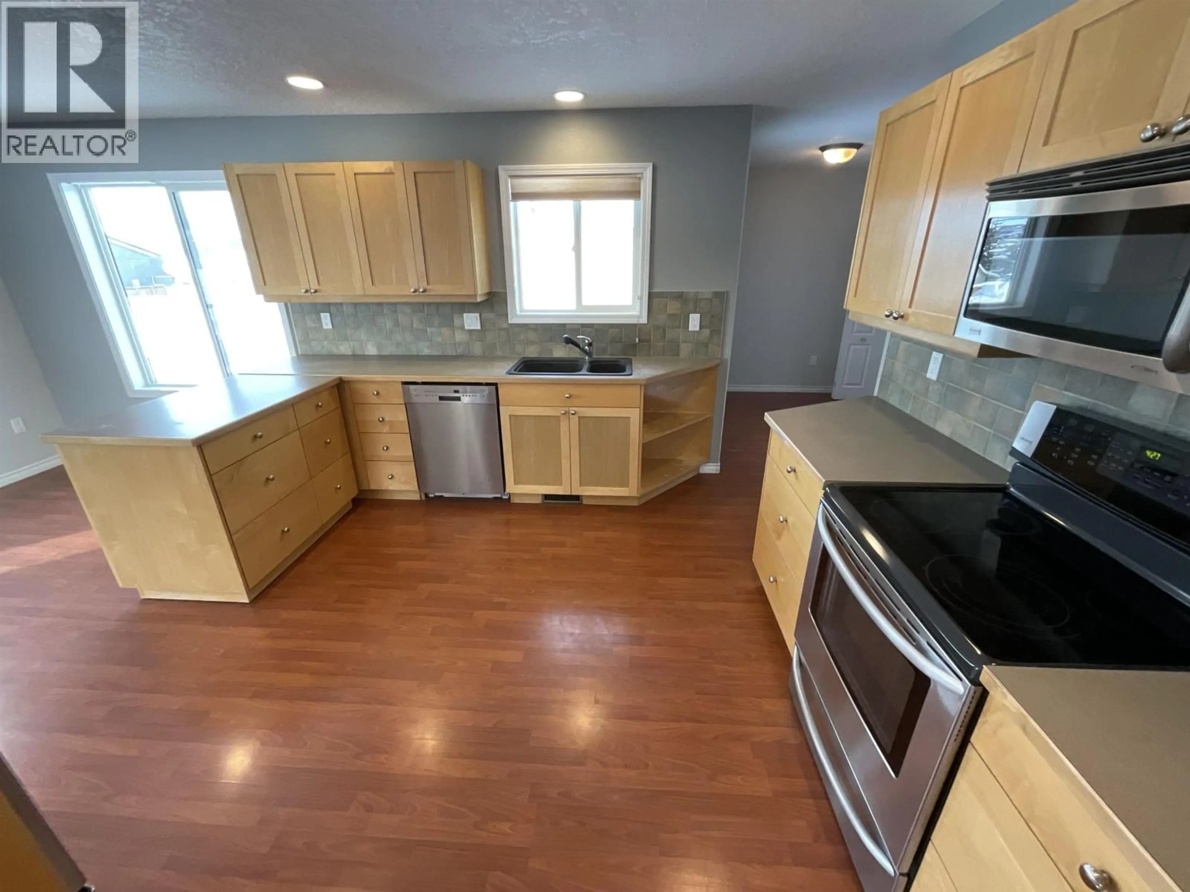 Open concept kitchen, unknown for 9916 111 AVENUE, Fort St. John British Columbia V1J2V1