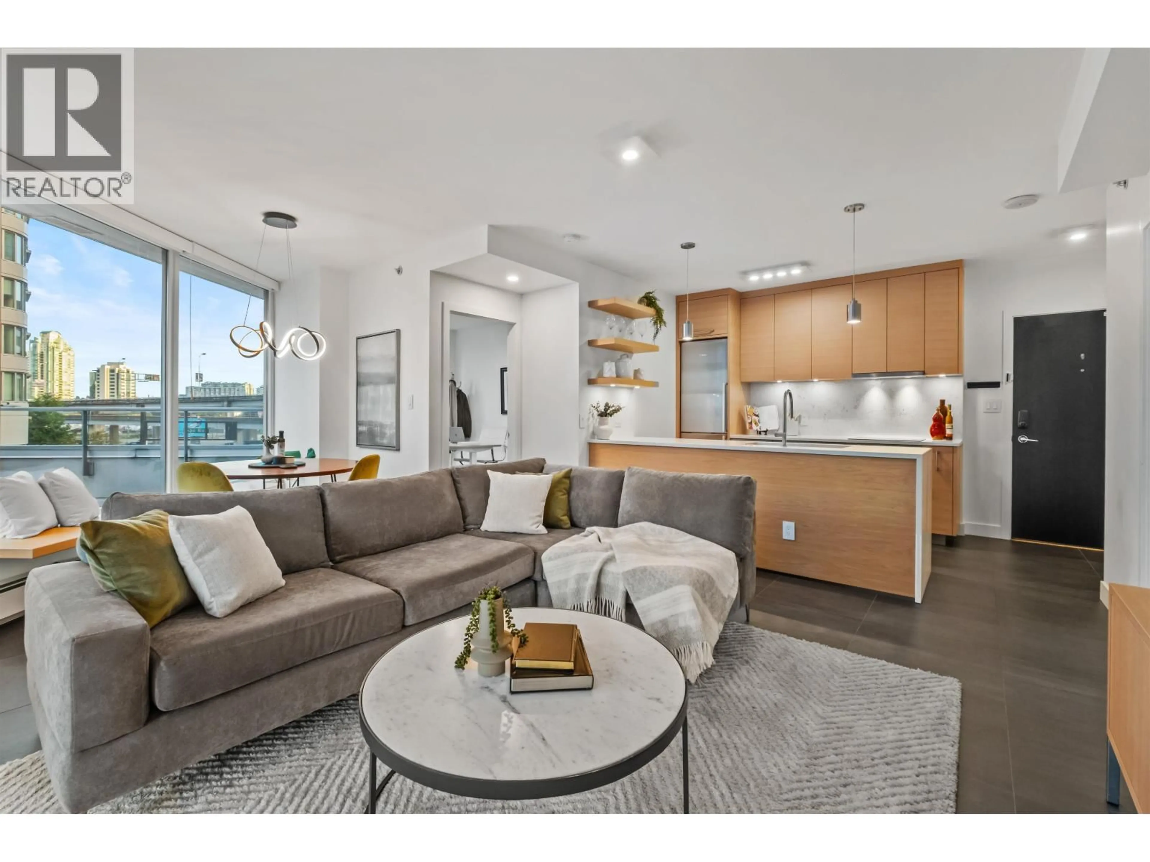 Living room with furniture, unknown for 202 - 689 ABBOTT STREET, Vancouver British Columbia V6B0J2