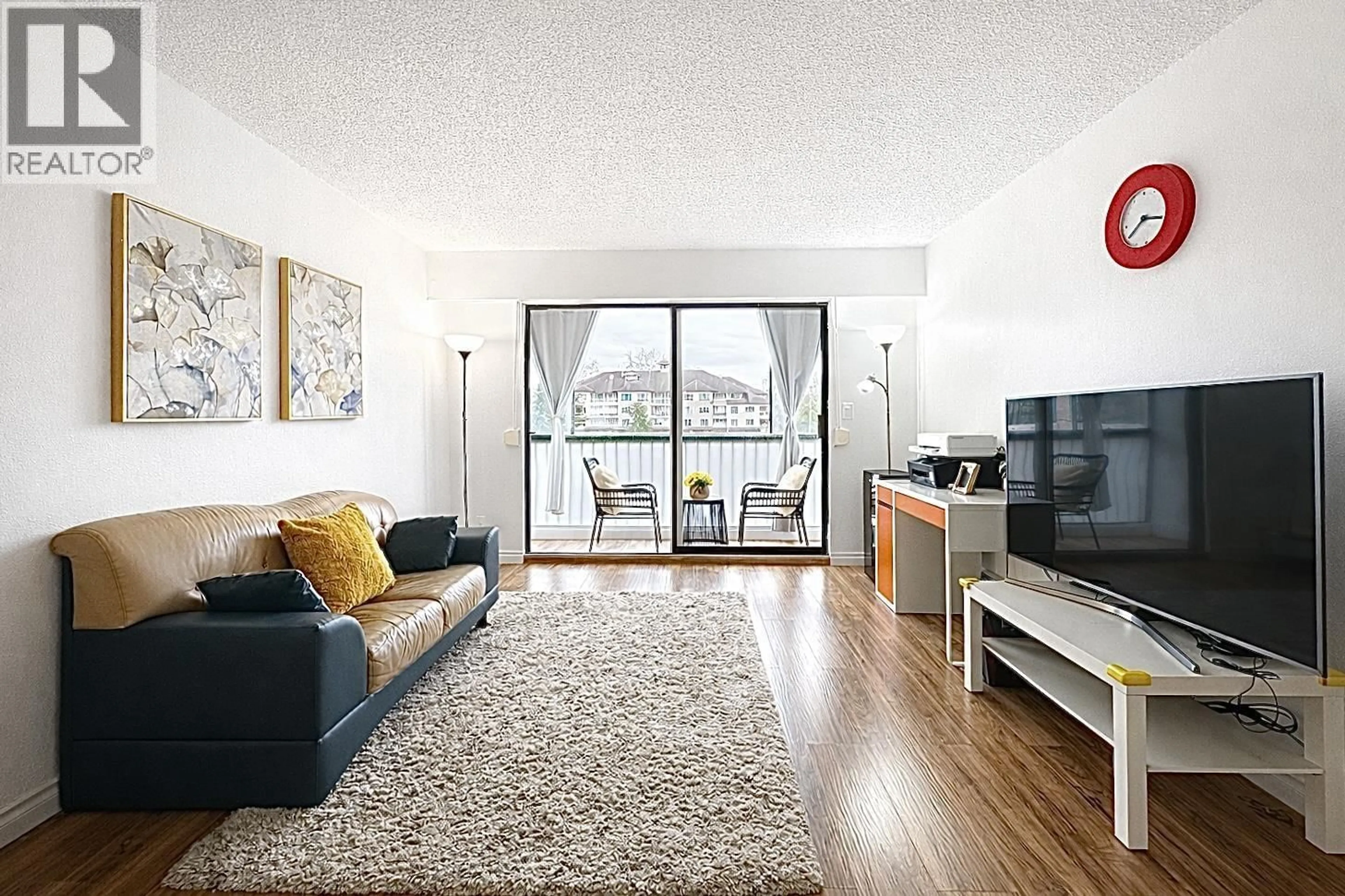 Living room with furniture, unknown for 203 - 2425 SHAUGHNESSY STREET, Port Coquitlam British Columbia V3C3E6