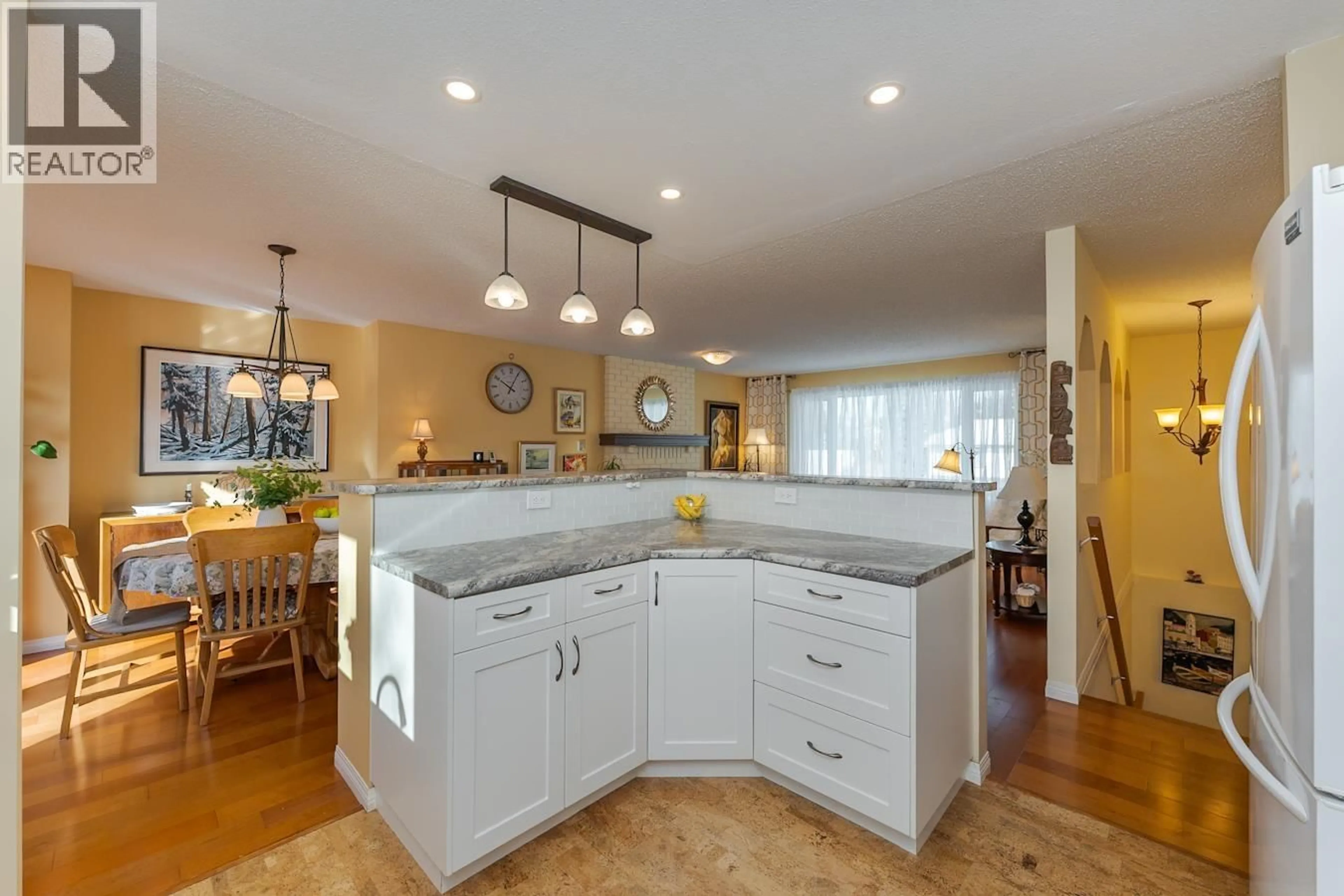 Open concept kitchen, ceramic/tile floor for 8173 ST JOHN CRESCENT, Prince George British Columbia V2N4H6