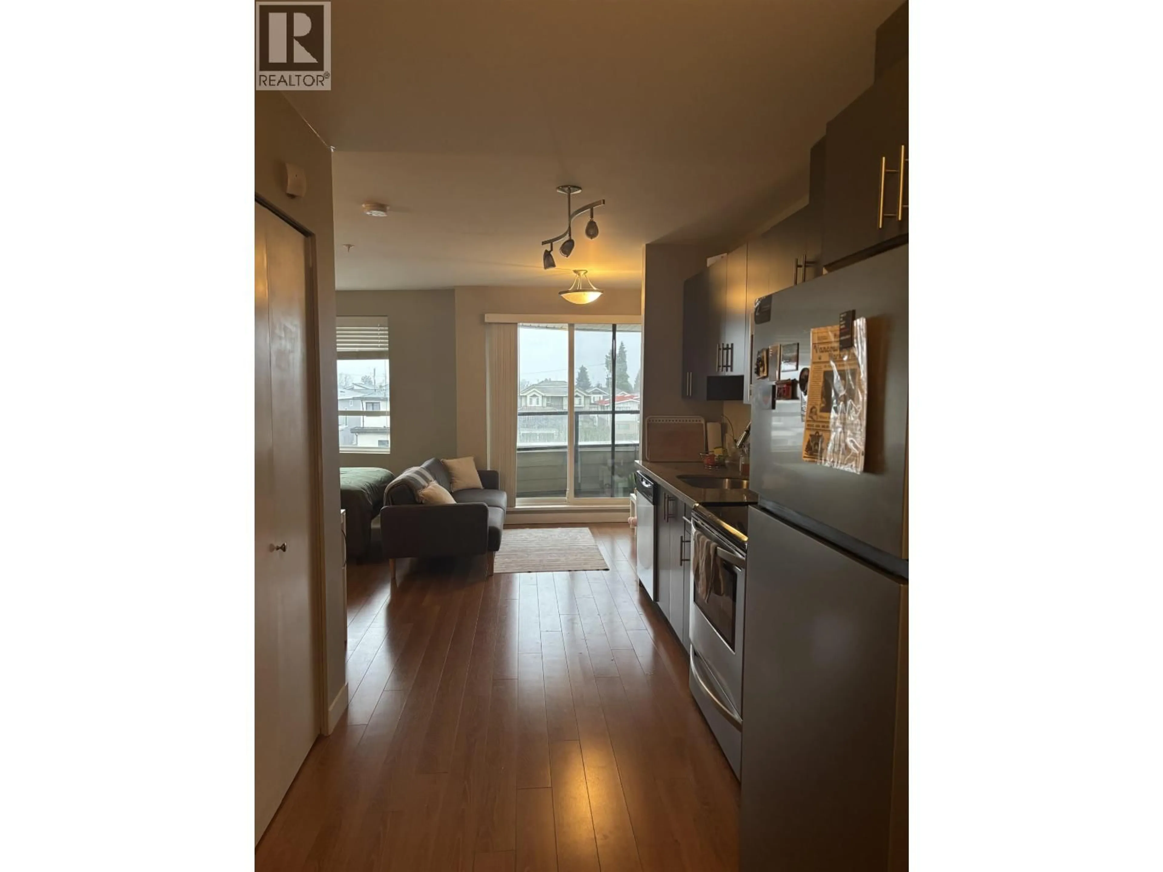 Open concept kitchen, wood/laminate floor for 305 - 7738 EDMONDS STREET, Burnaby British Columbia V3N1B8