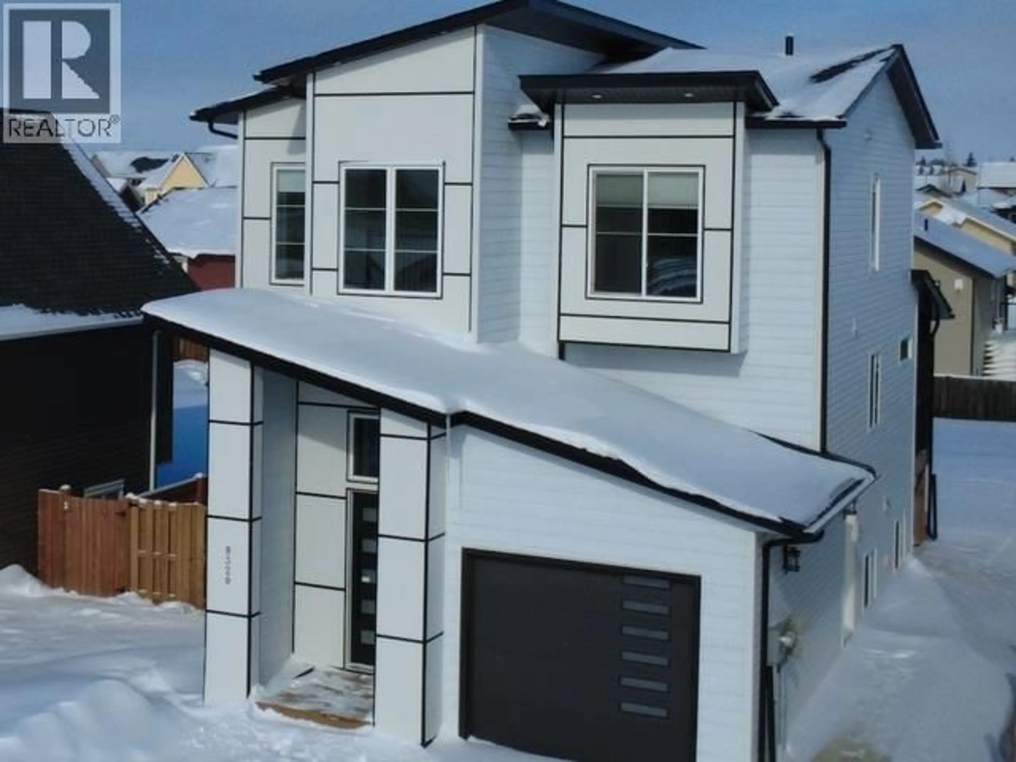 Home with vinyl exterior material, street for 8320 85 AVENUE, Fort St. John British Columbia V1J0G3