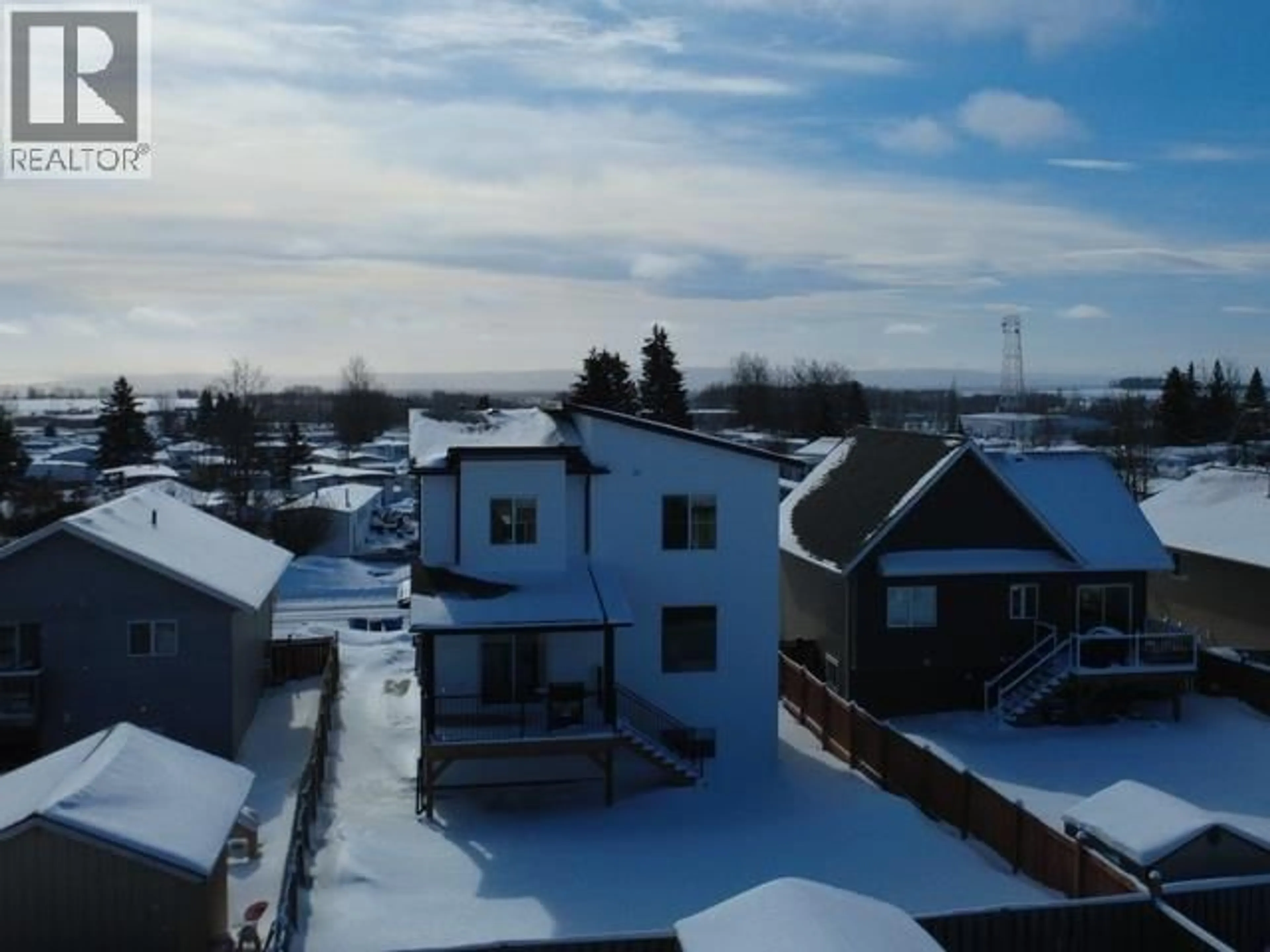 A pic from outside/outdoor area/front of a property/back of a property/a pic from drone, city buildings view from balcony for 8320 85 AVENUE, Fort St. John British Columbia V1J0G3