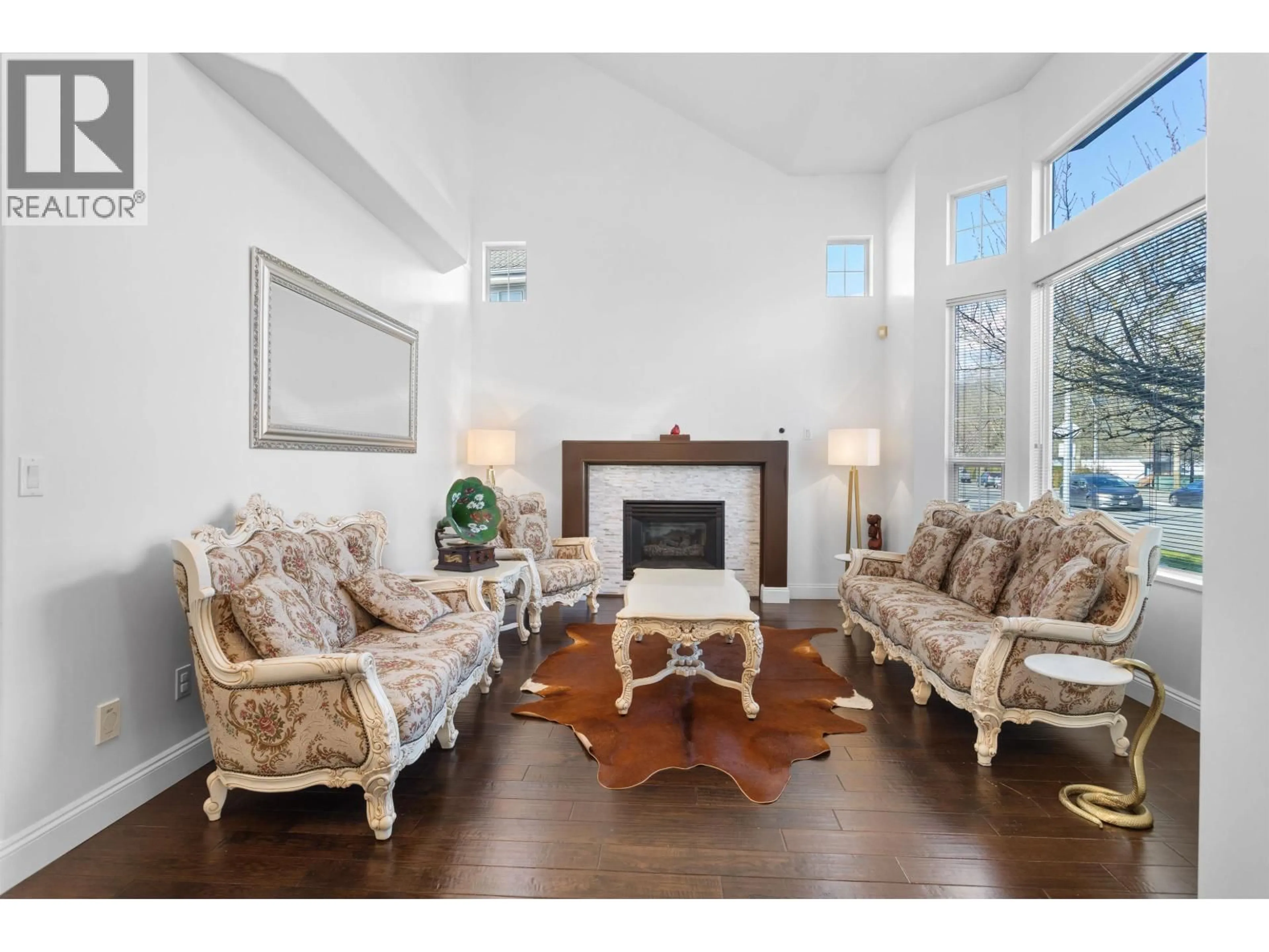 Living room with furniture, wood/laminate floor for 1288 RIVERSIDE DRIVE, Port Coquitlam British Columbia V3B7Y2