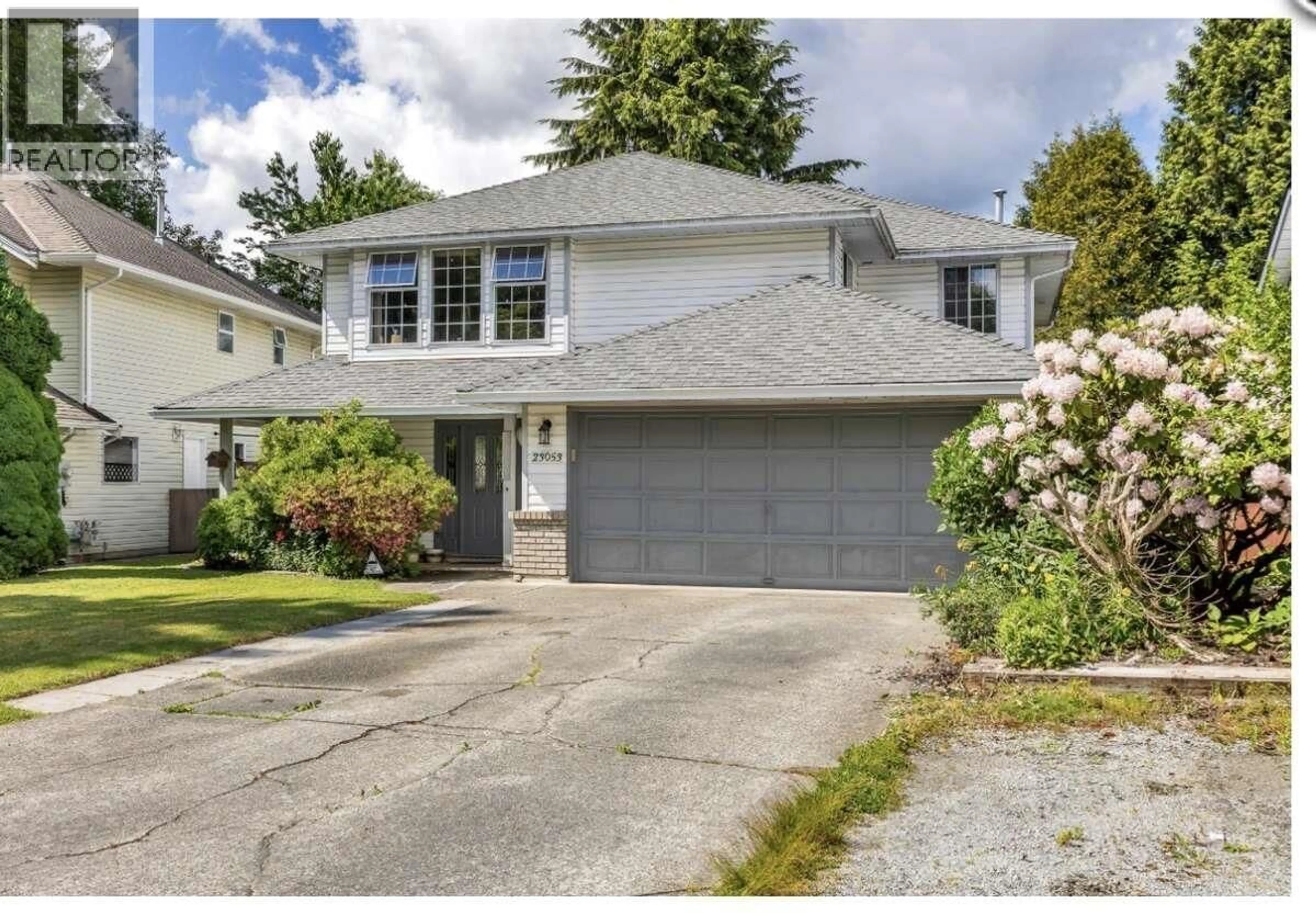 Home with vinyl exterior material, street for 23053 125A AVENUE, Maple Ridge British Columbia V2X0S2