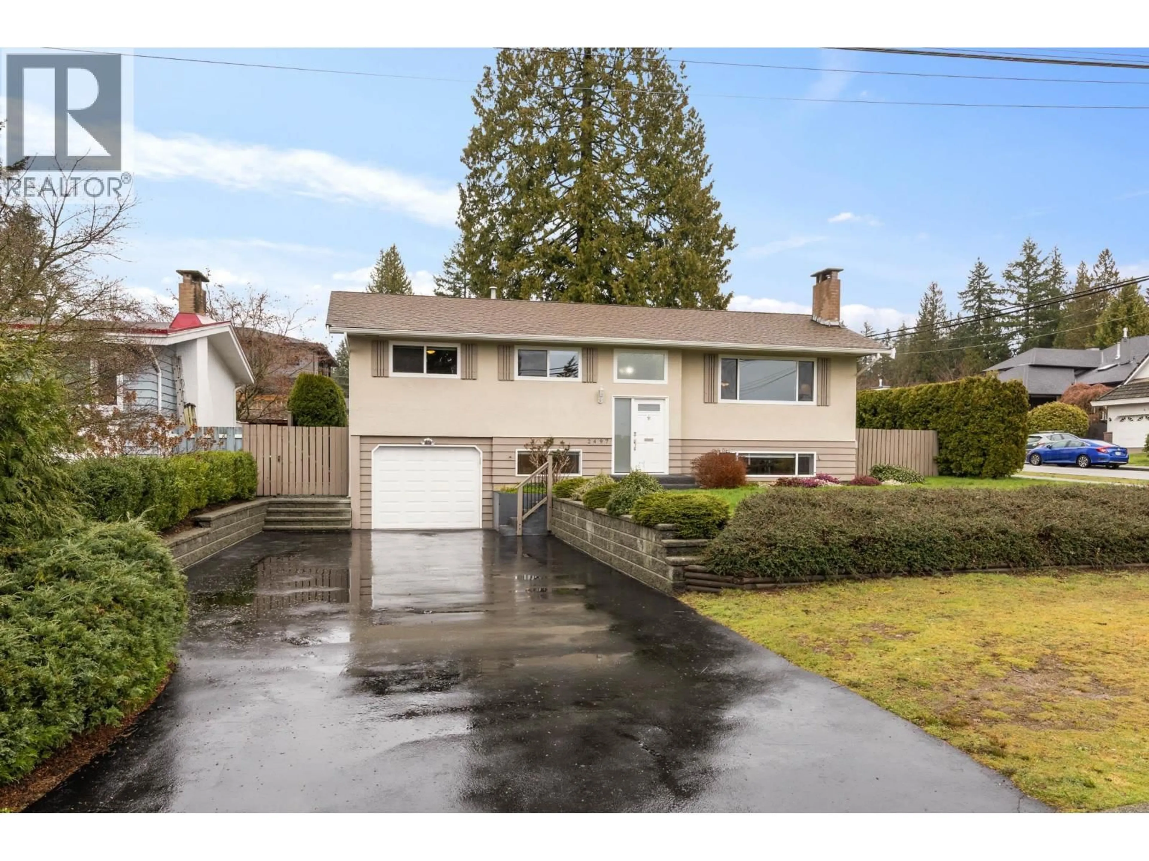 Home with vinyl exterior material, street for 2497 TOLMIE AVENUE, Coquitlam British Columbia V3K3E6