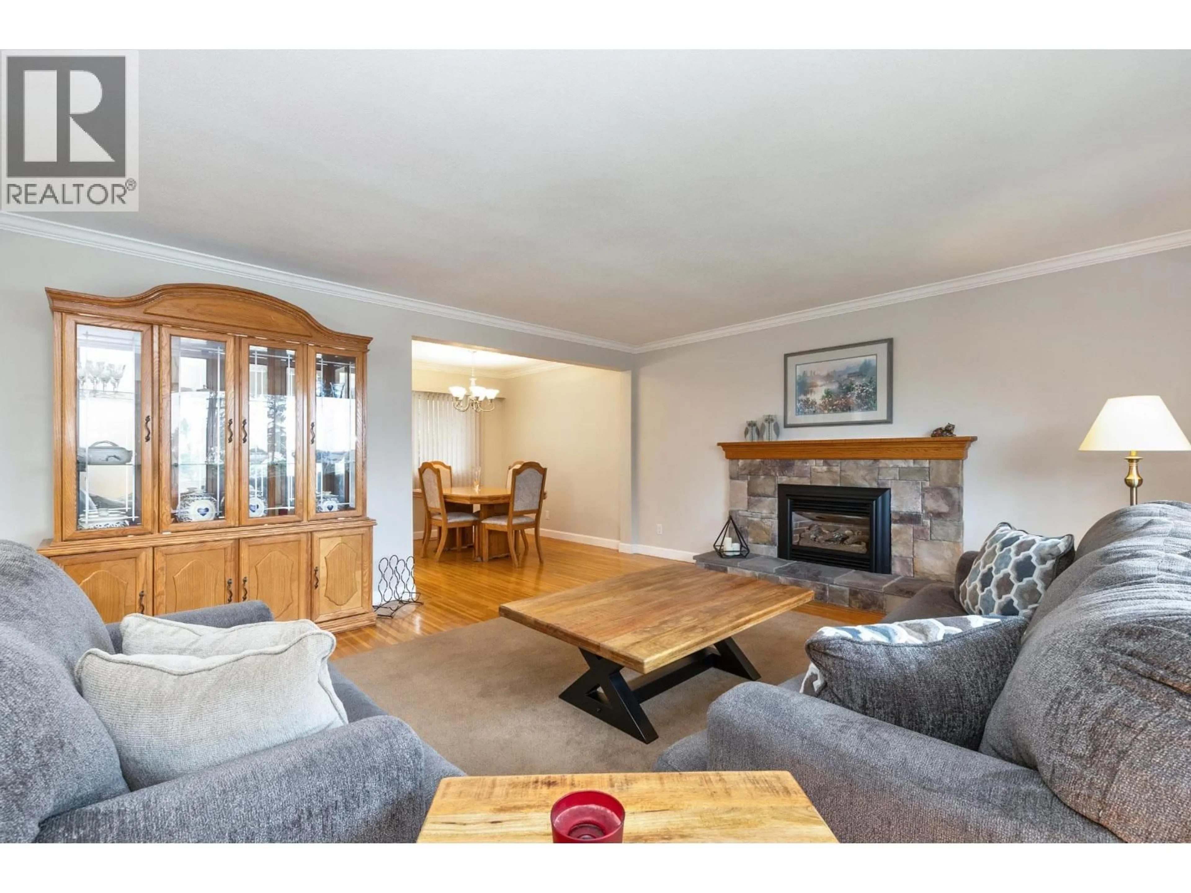 Living room with furniture, wood/laminate floor for 2497 TOLMIE AVENUE, Coquitlam British Columbia V3K3E6