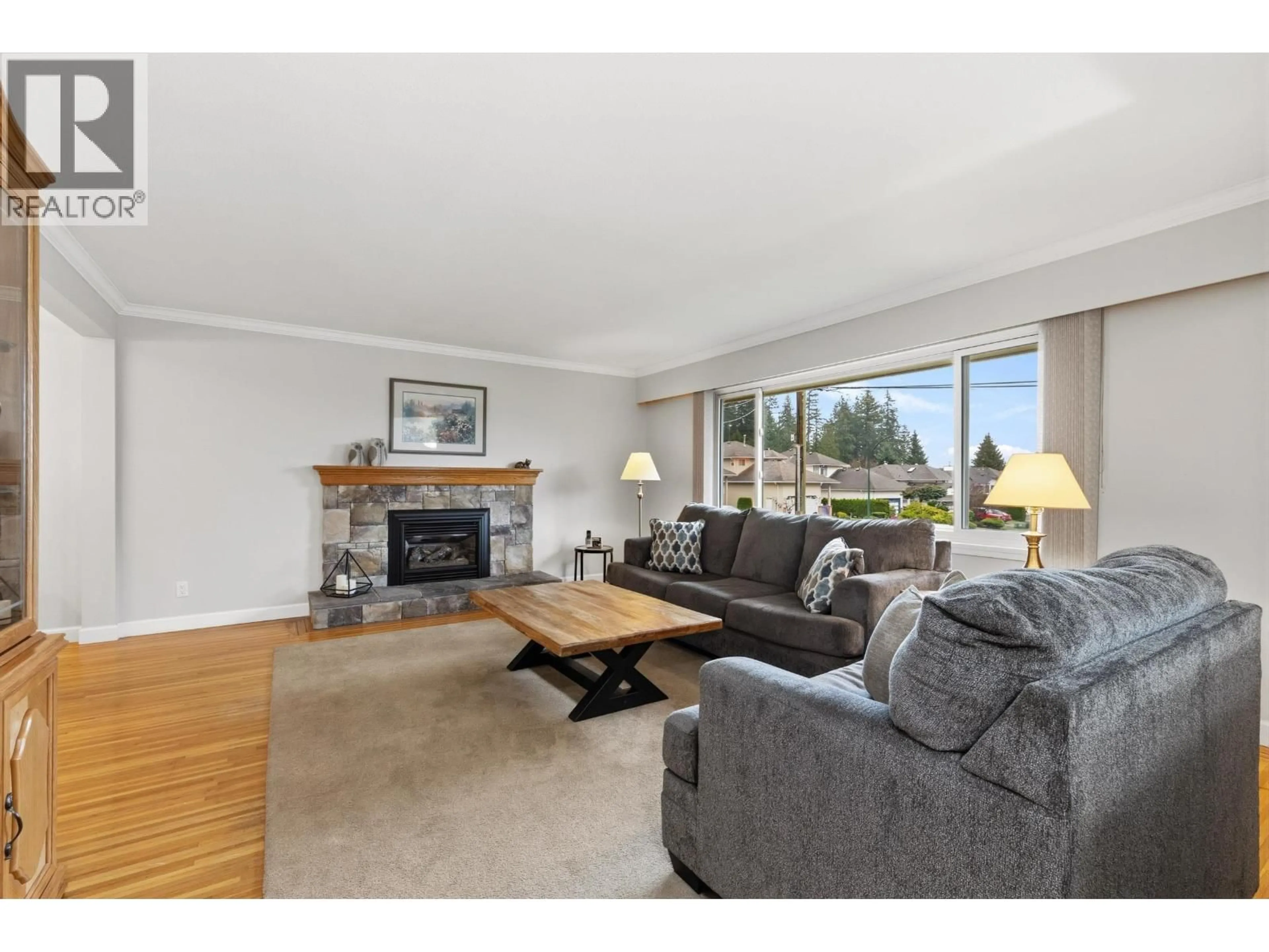 Living room with furniture, wood/laminate floor for 2497 TOLMIE AVENUE, Coquitlam British Columbia V3K3E6