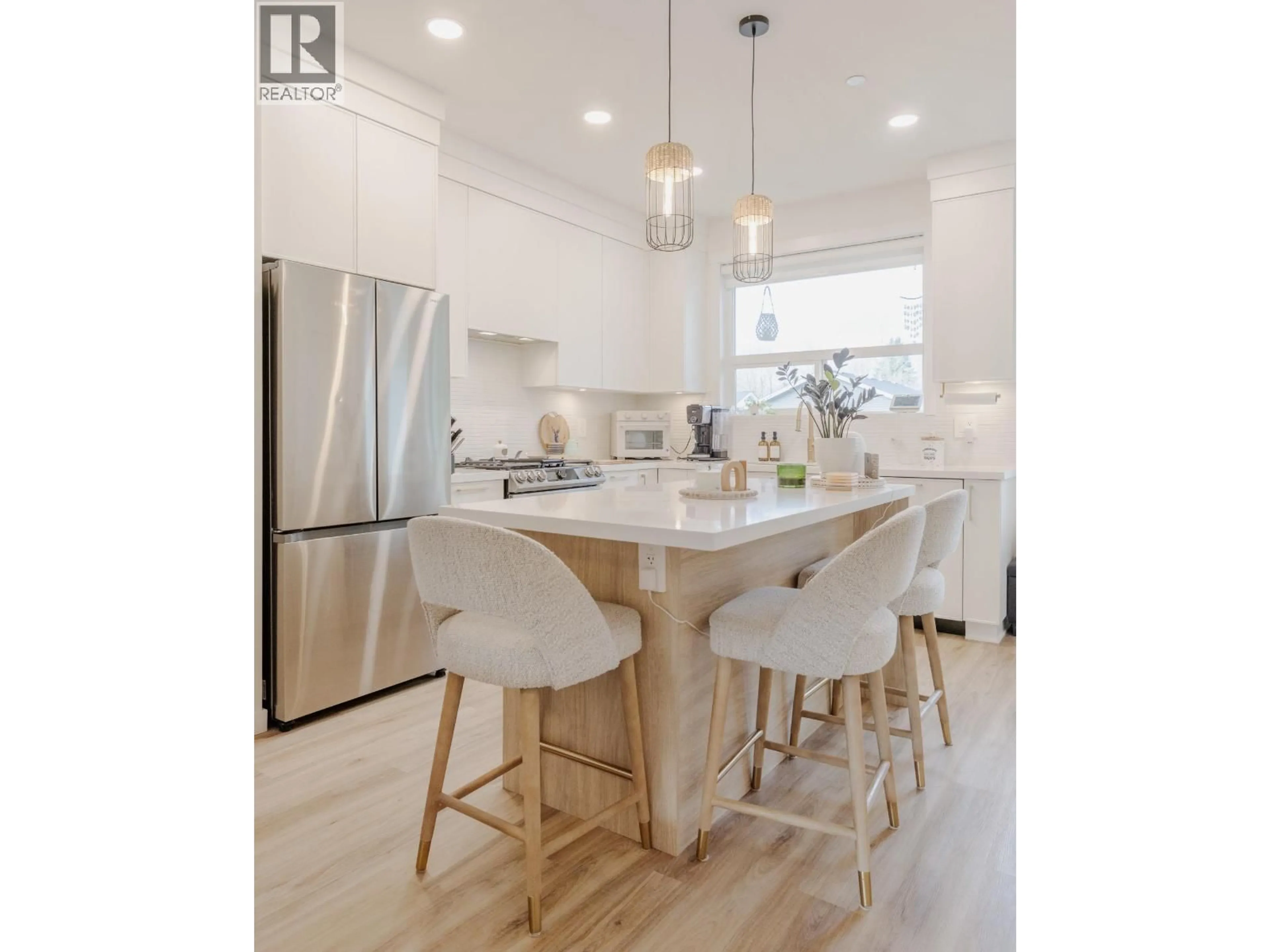 Open concept kitchen, wood/laminate floor for 25097 112 AVENUE, Maple Ridge British Columbia V2W0K6