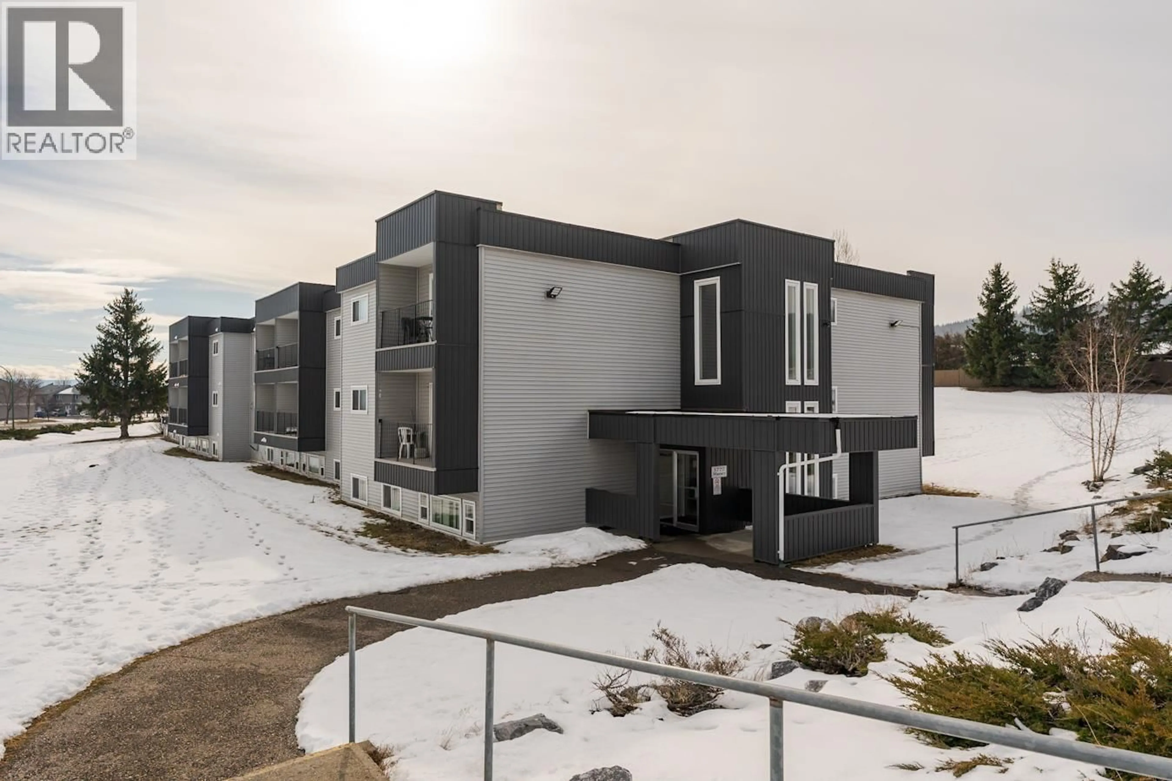 A pic from outside/outdoor area/front of a property/back of a property/a pic from drone, unknown for 107 - 3777 MASSEY DRIVE, Prince George British Columbia V2N4J6