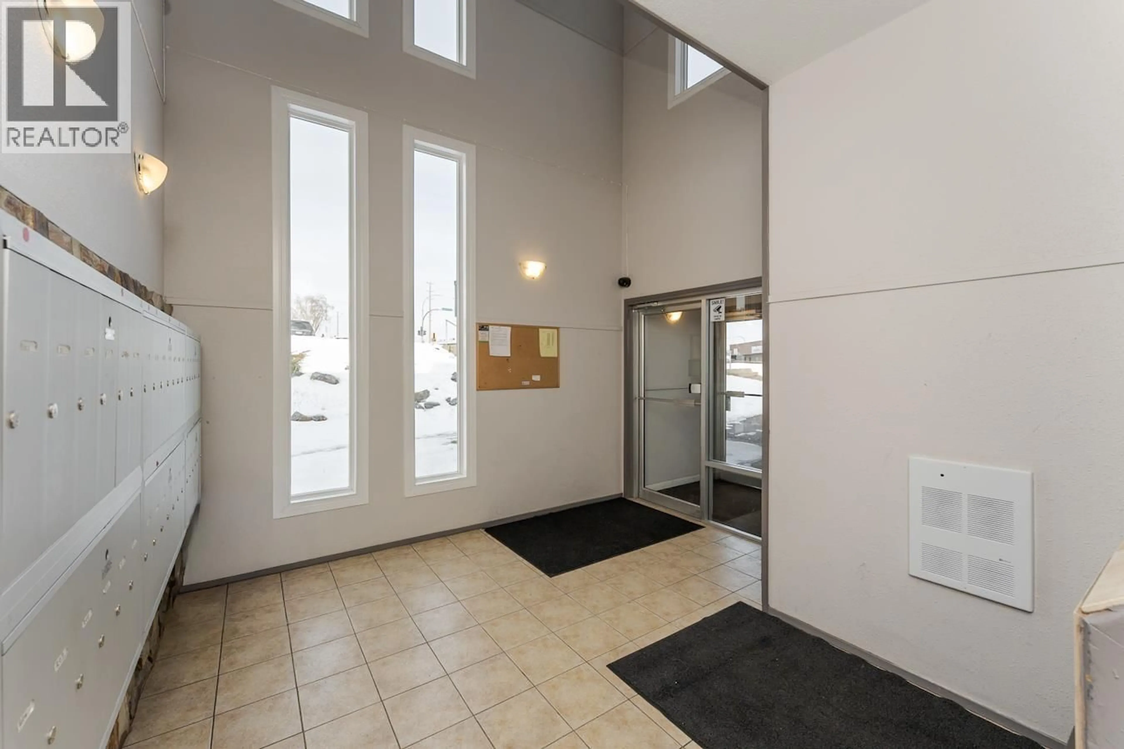 Indoor foyer for 107 - 3777 MASSEY DRIVE, Prince George British Columbia V2N4J6
