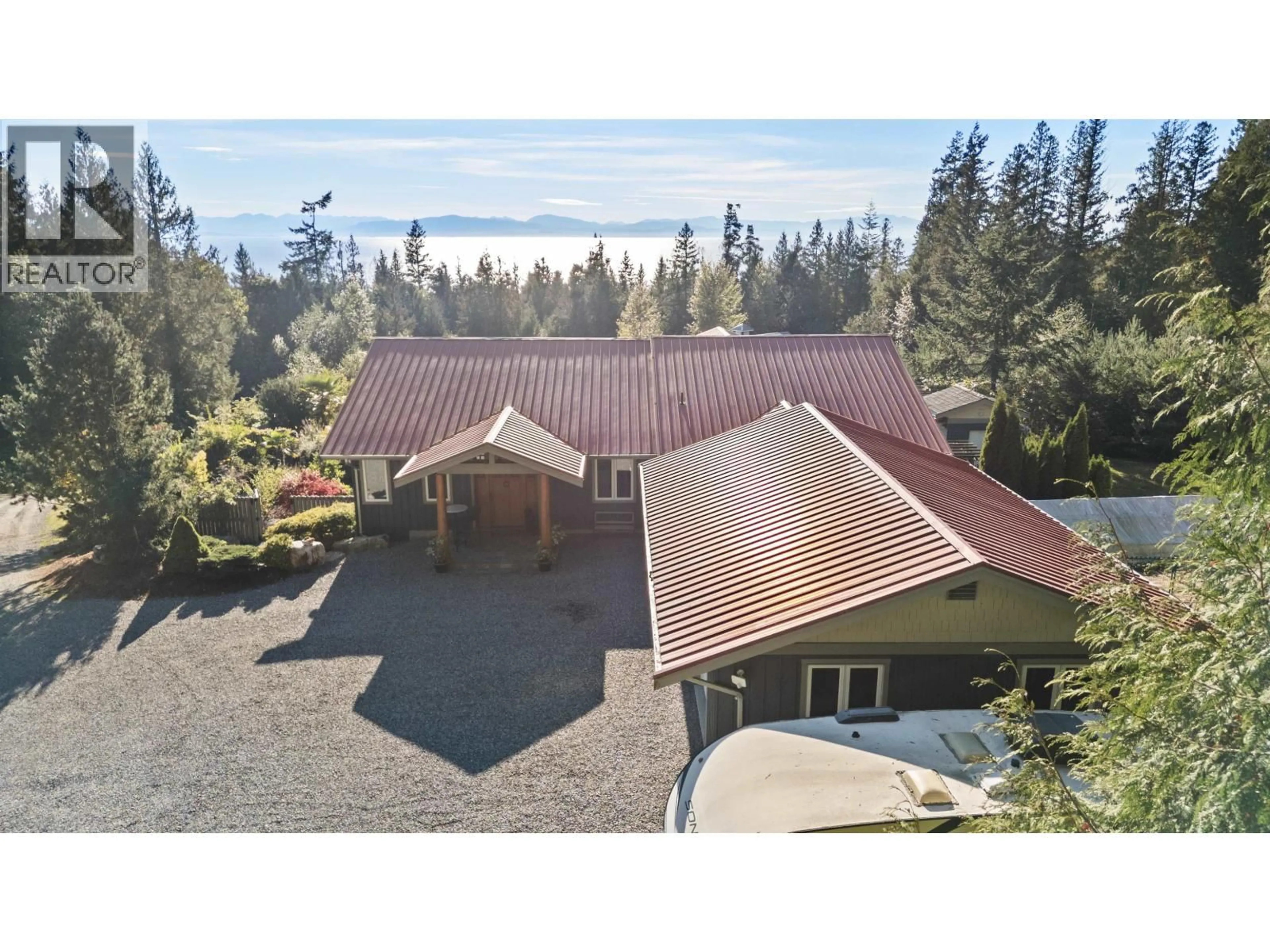 A pic from outside/outdoor area/front of a property/back of a property/a pic from drone, water/lake/river/ocean view for 2440 SUNSHINE COAST HIGHWAY, Roberts Creek British Columbia V0N2W5