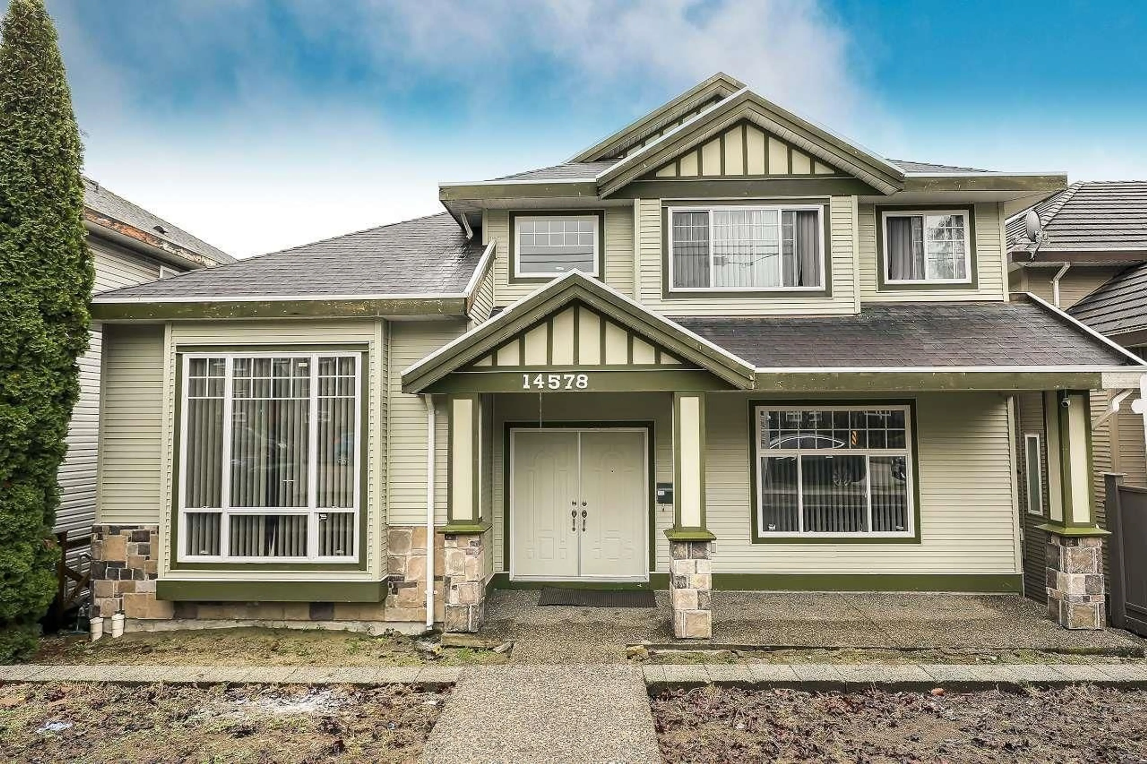 Home with vinyl exterior material, street for 14578 68 AVENUE, Surrey British Columbia V3S2A9