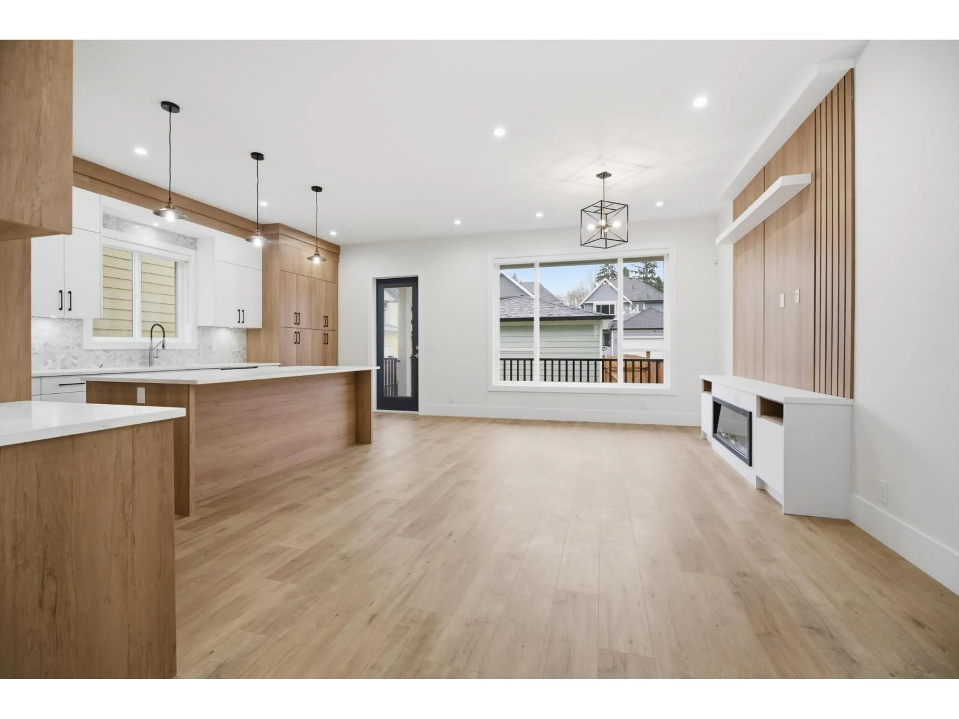 Open concept kitchen, wood/laminate floor for 17130 1 AVENUE, Surrey British Columbia V3Z9R2