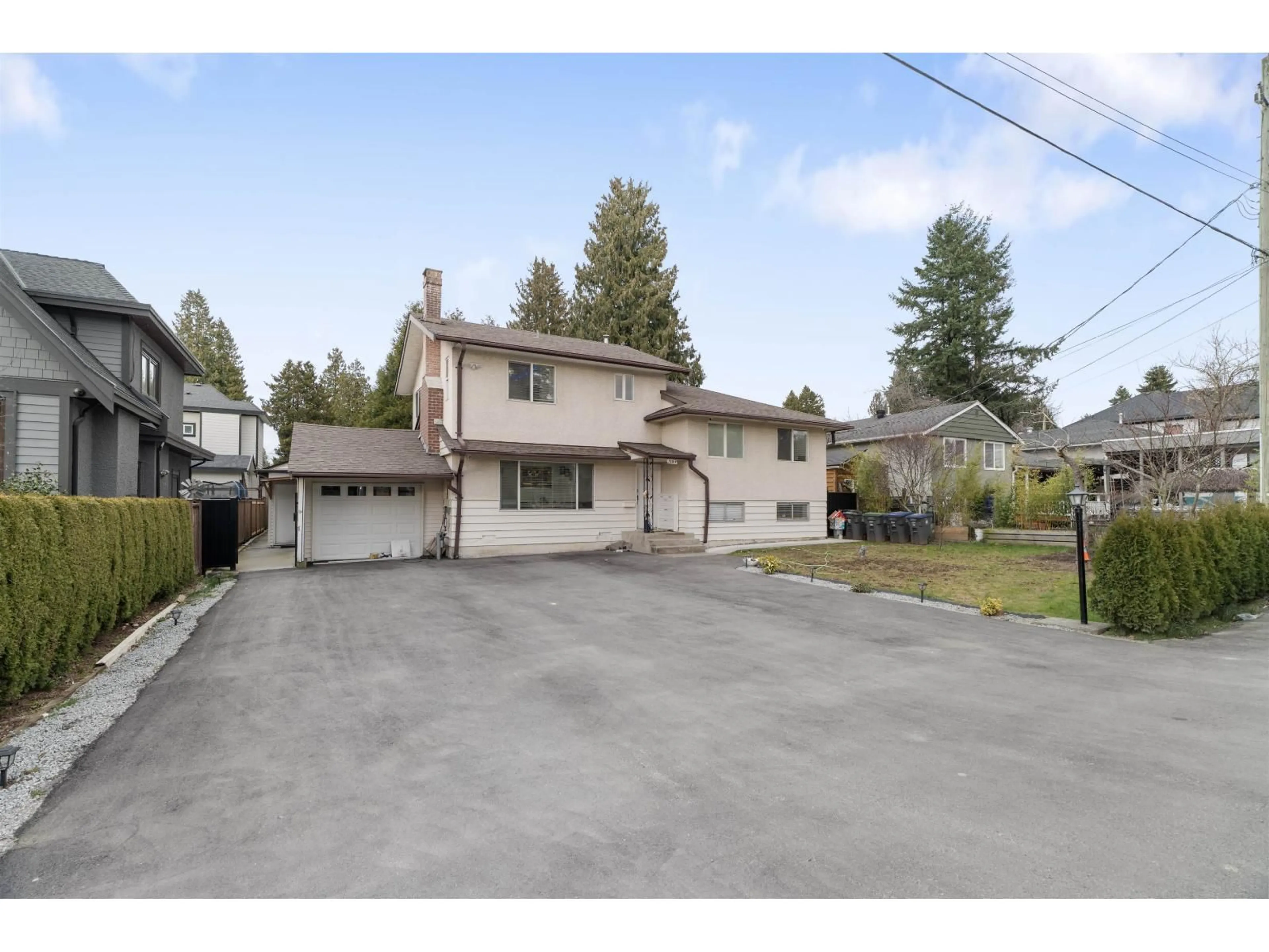 A pic from outside/outdoor area/front of a property/back of a property/a pic from drone, street for 12957 98B AVENUE, Surrey British Columbia V3T1C9