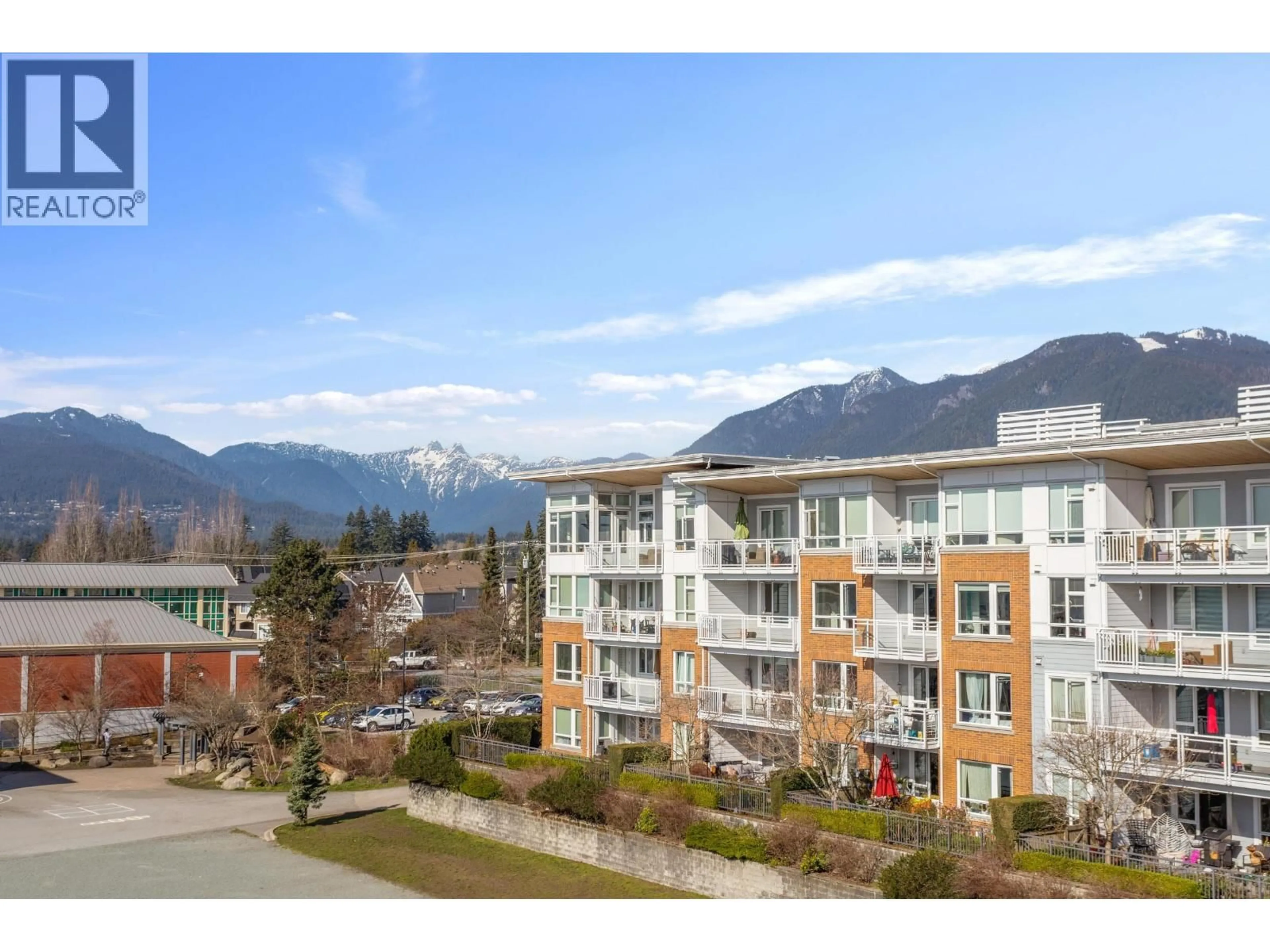 A pic from outside/outdoor area/front of a property/back of a property/a pic from drone, mountain view for 401 - 717 CHESTERFIELD AVENUE, North Vancouver British Columbia V7M3L8