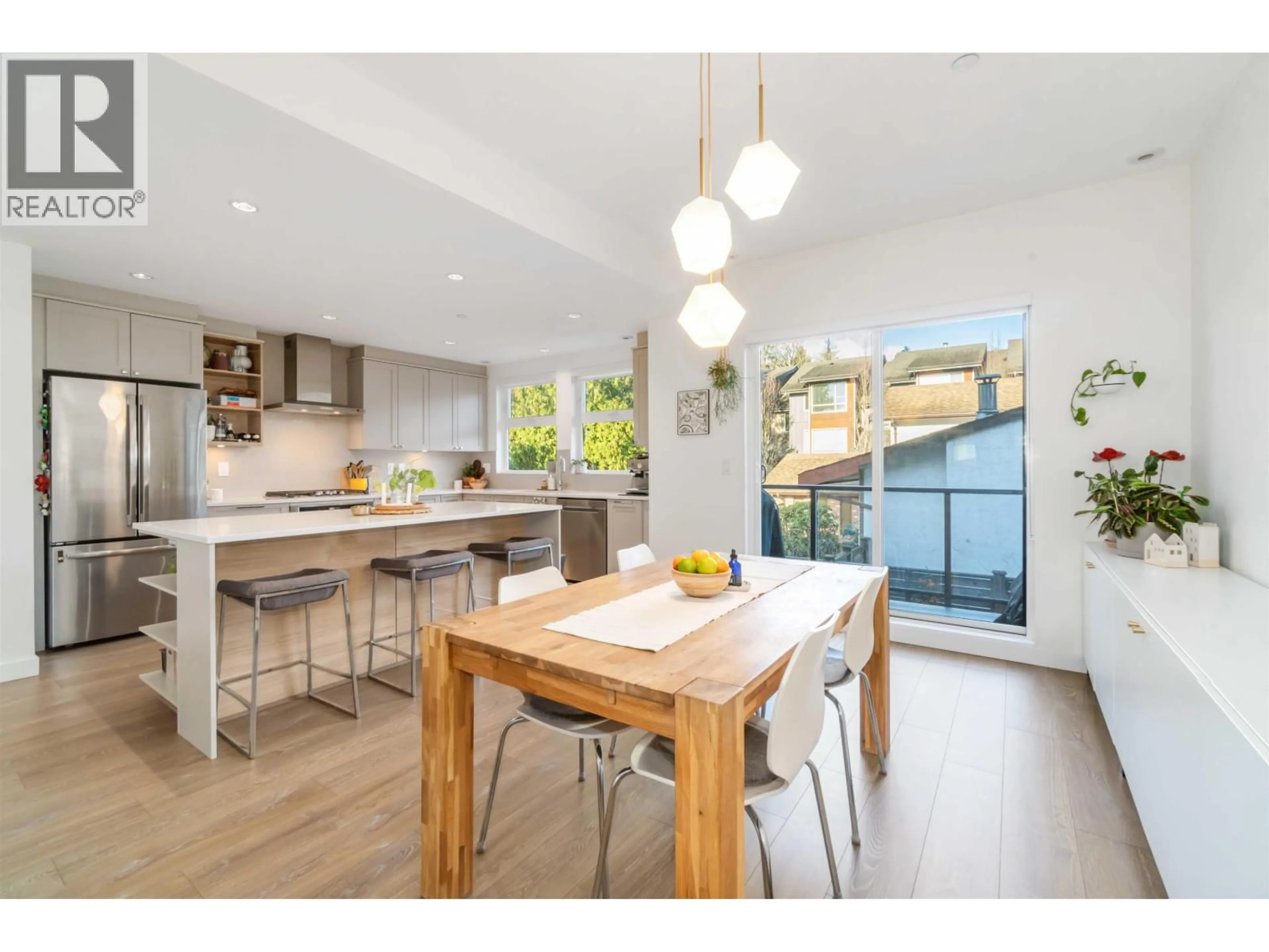 Open concept kitchen, wood/laminate floor for 8 - 856 ORWELL STREET, Vancouver British Columbia V7J2G3