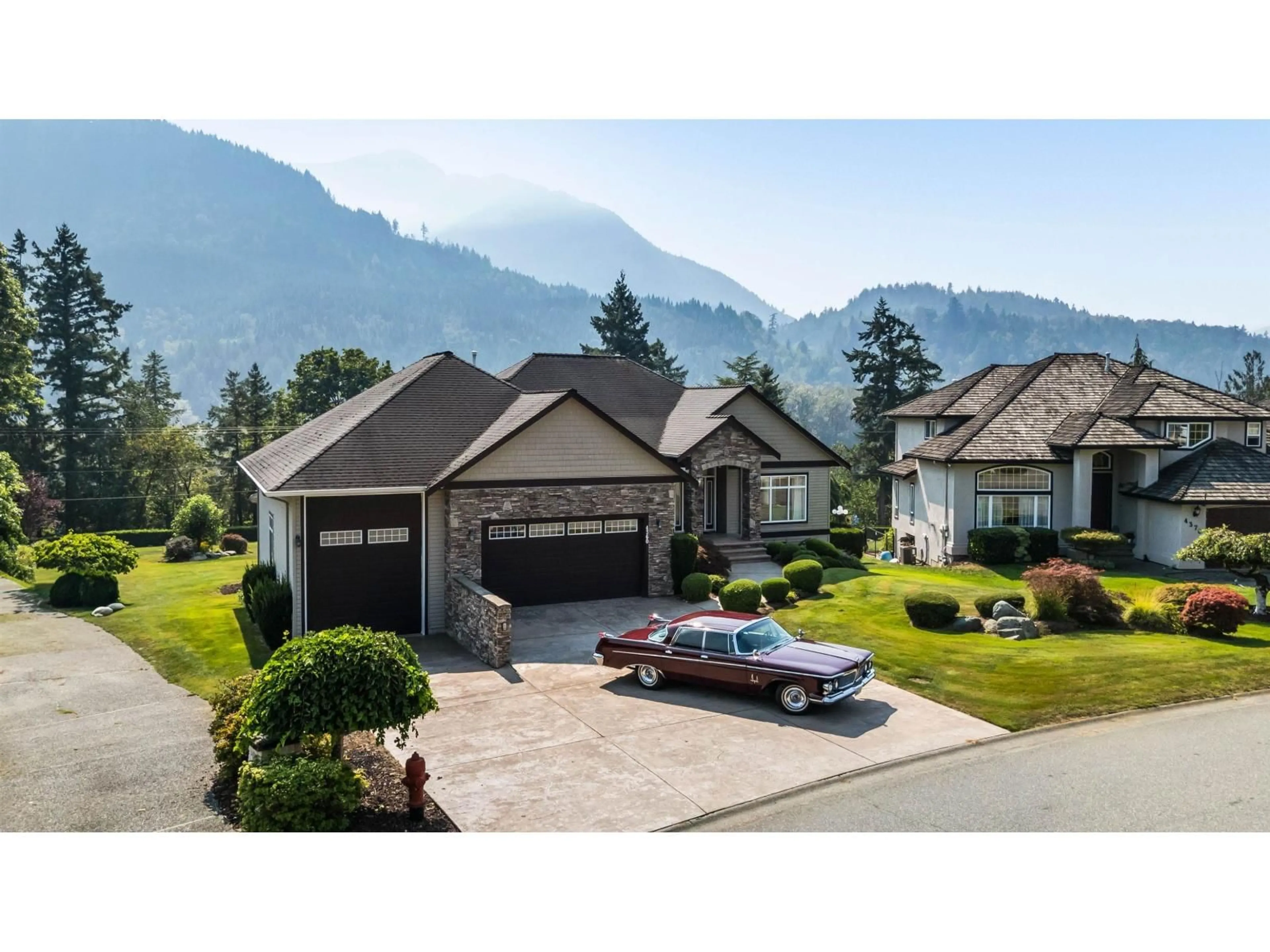 A pic from outside/outdoor area/front of a property/back of a property/a pic from drone, mountain view for 4360 ESTATE DRIVE, Chilliwack British Columbia V2R3B4
