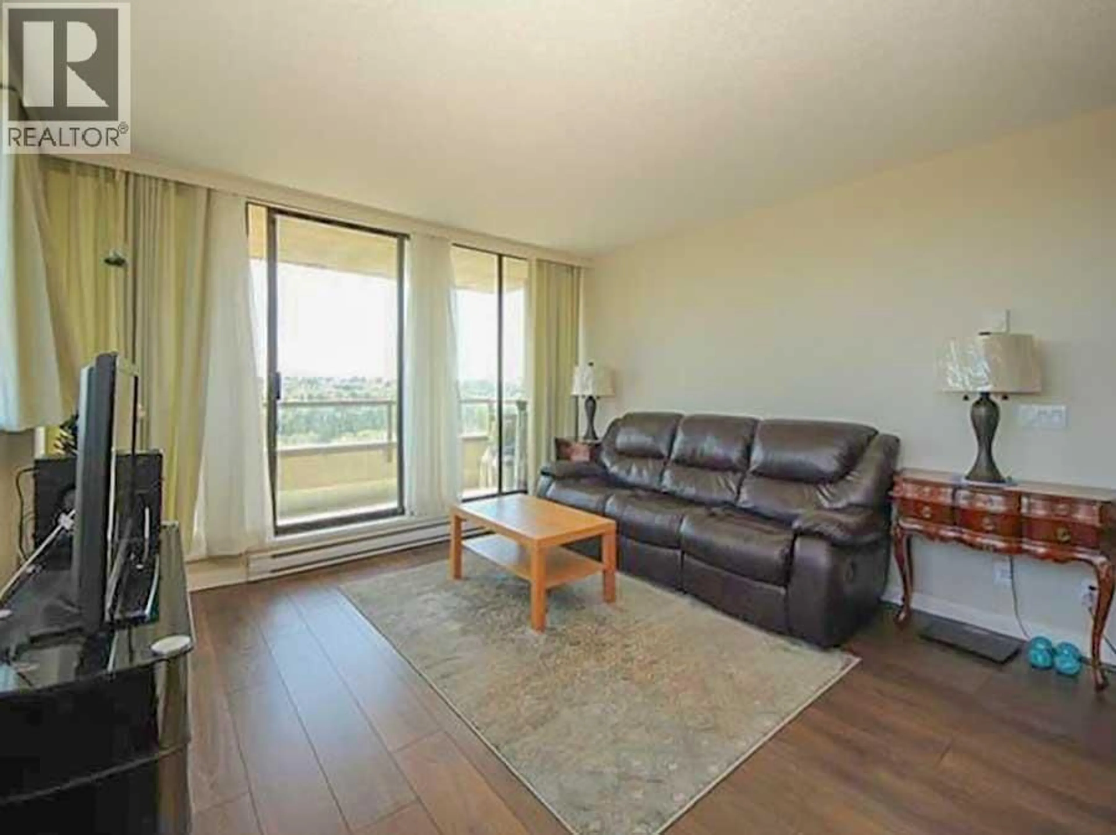 Living room with furniture, wood/laminate floor for 2002 - 3970 CARRIGAN COURT, Burnaby British Columbia V3N4S5