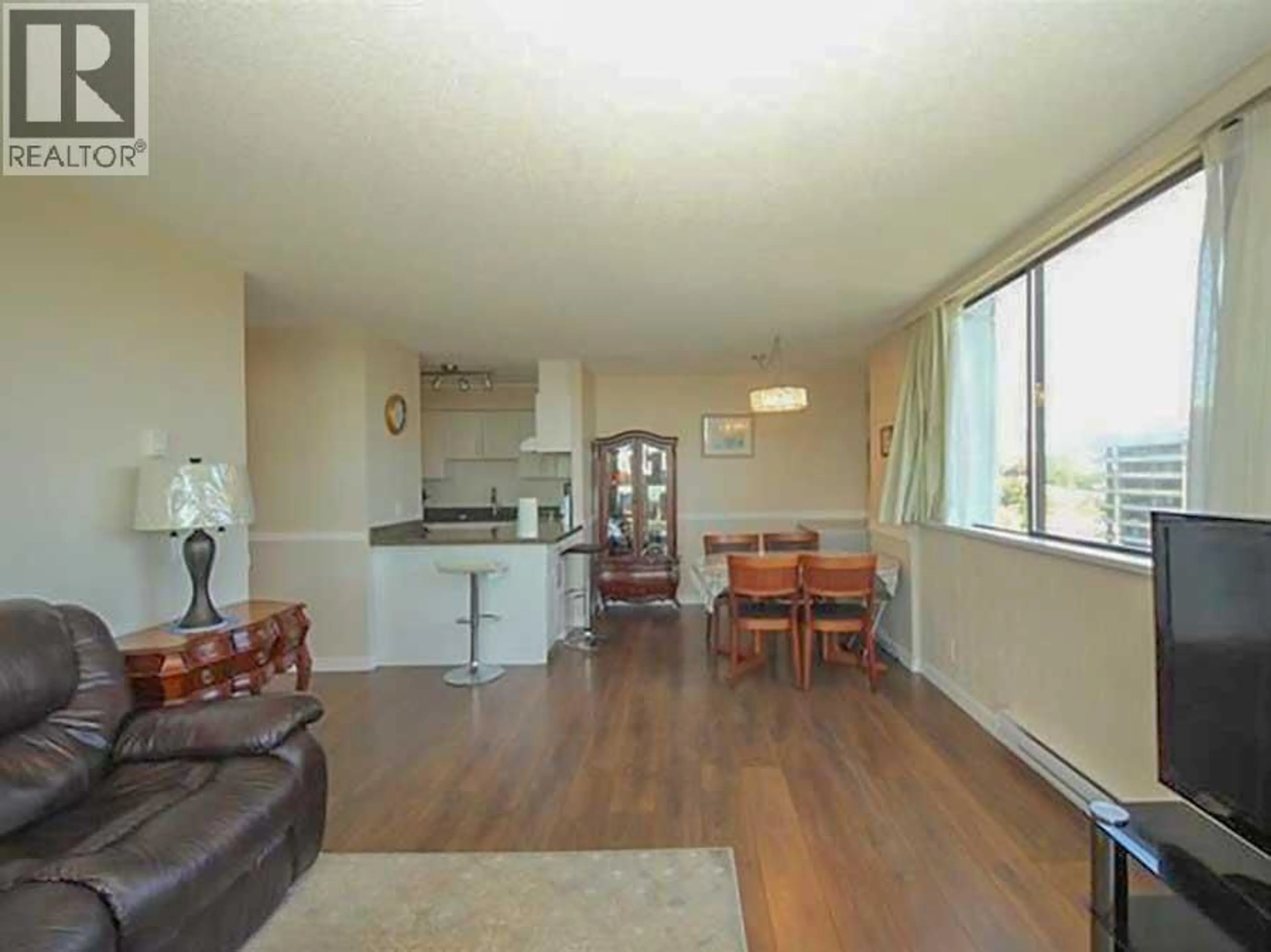 Living room with furniture, wood/laminate floor for 2002 - 3970 CARRIGAN COURT, Burnaby British Columbia V3N4S5